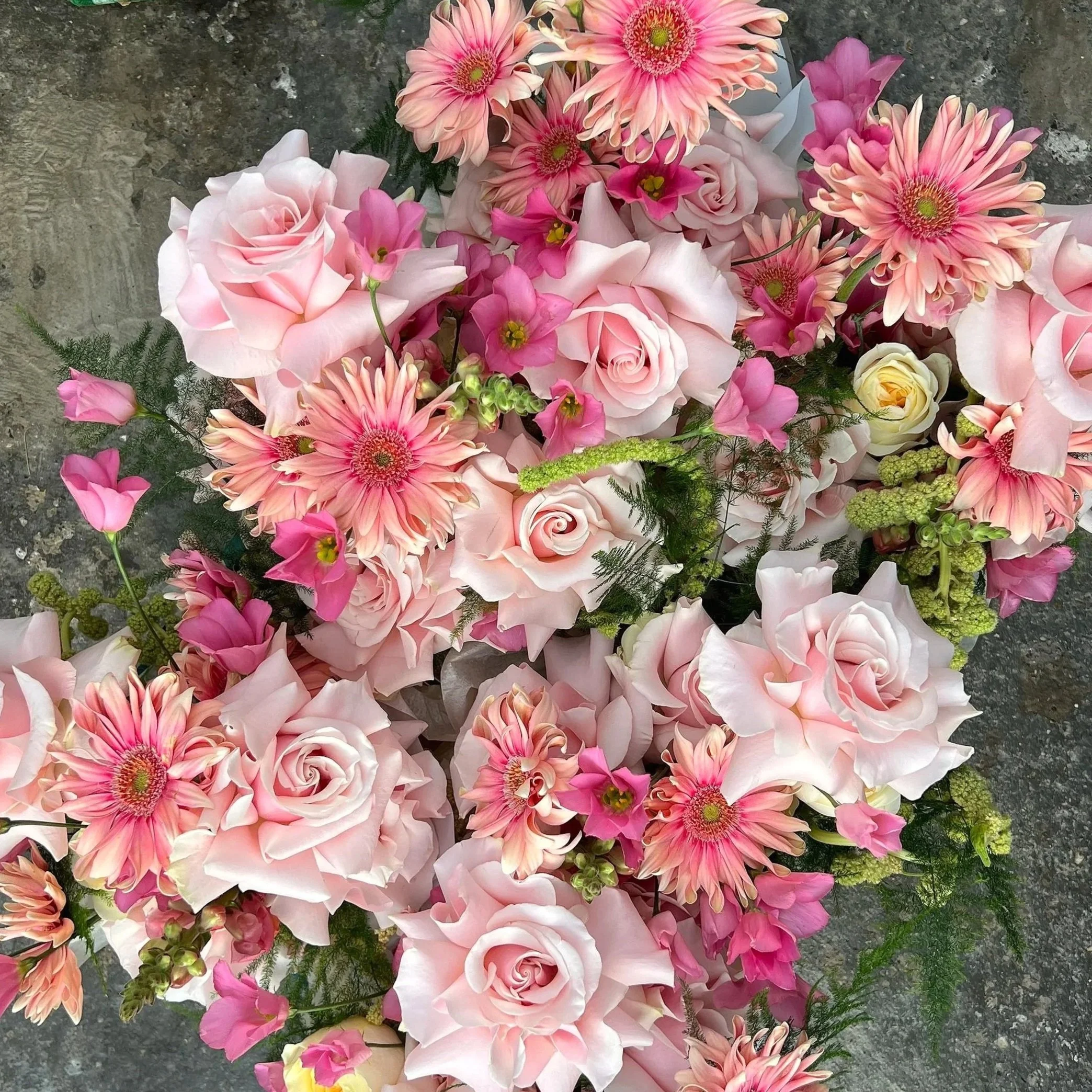 Bright and fun, pink and green wedding bouquets for a summer wedding at Hockwold Hall, Norfolk