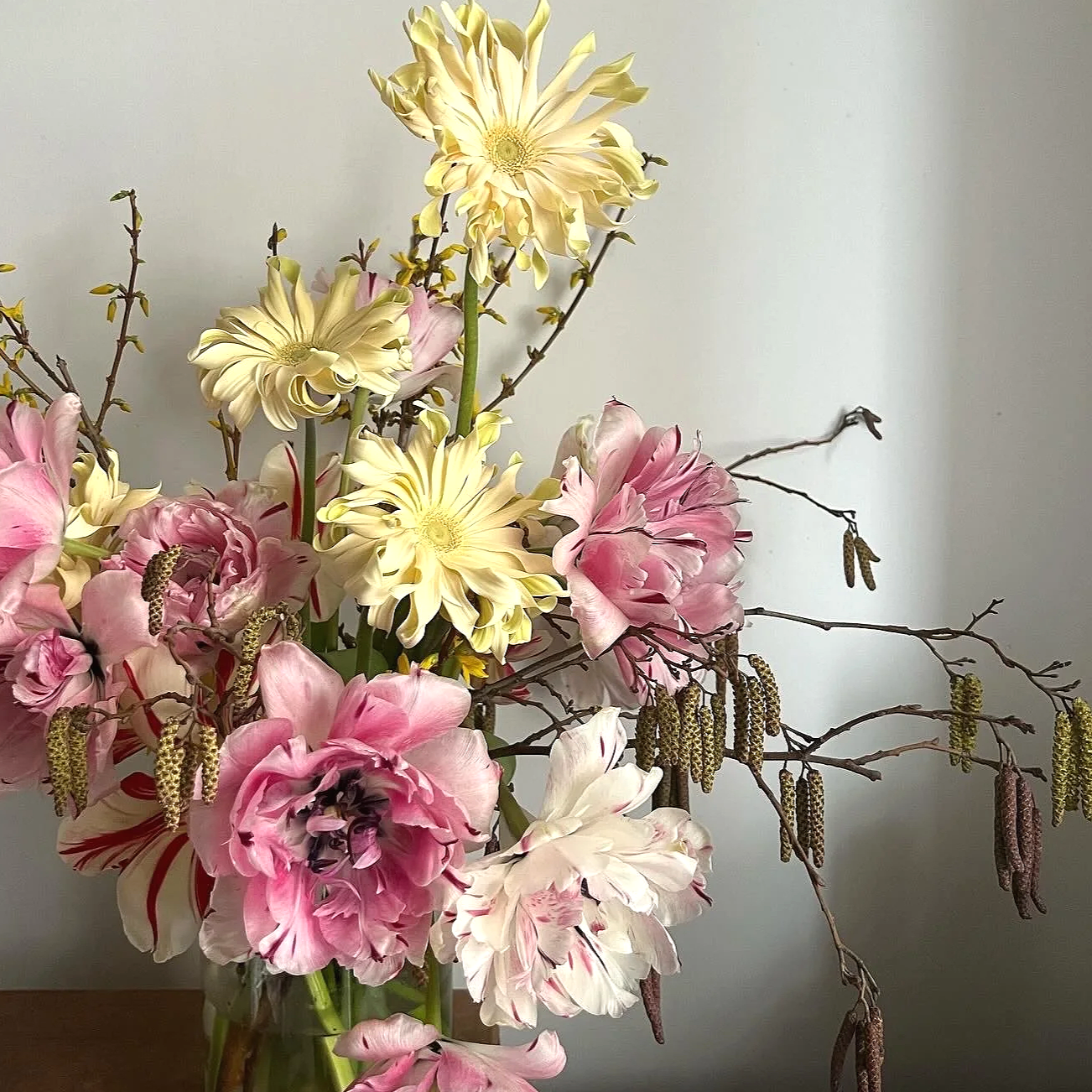 Floral vase arrangement using french tulips and pasta gerberas