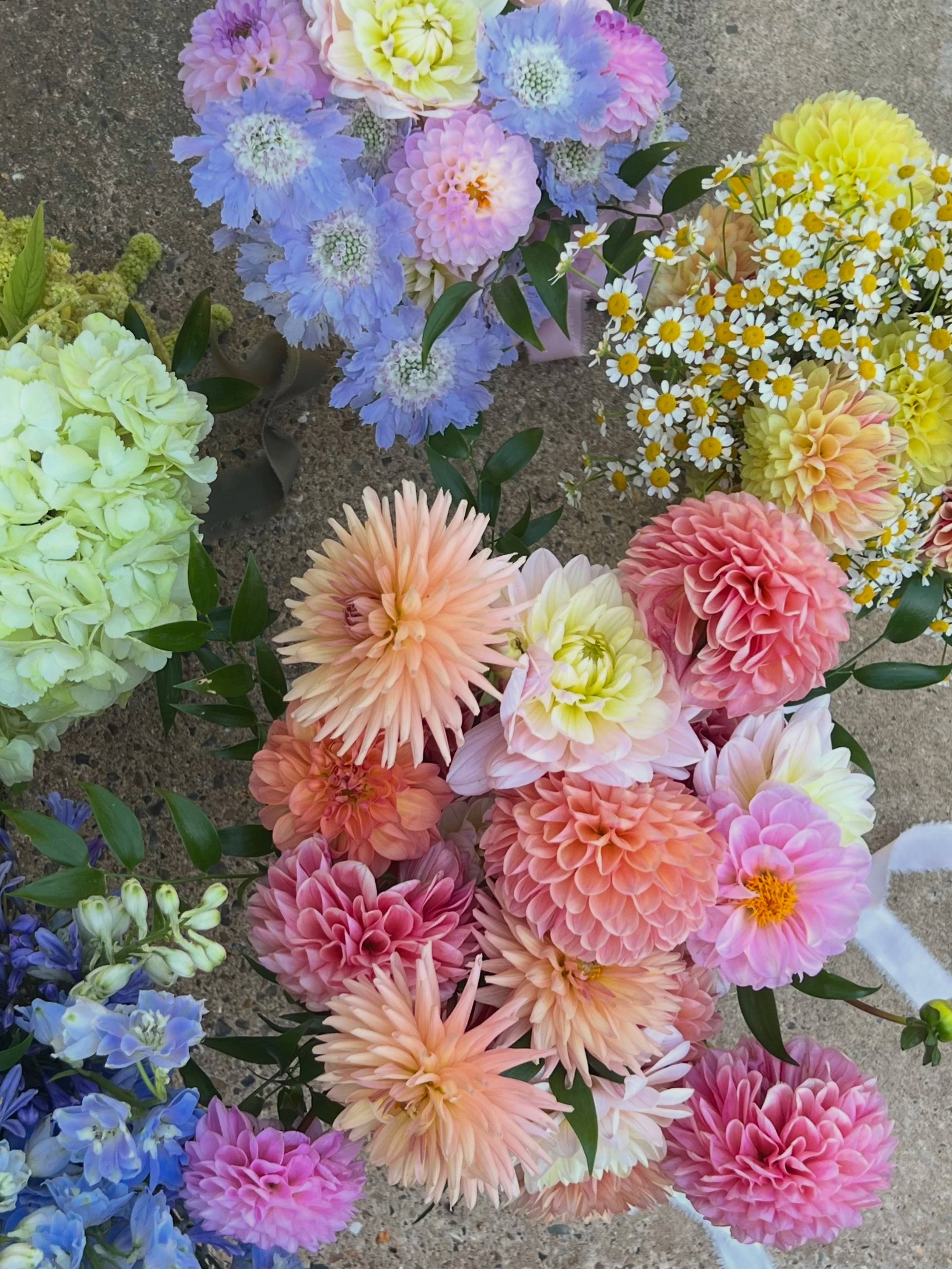 Bright and colourful bridal and bridesmaids bouquets in August