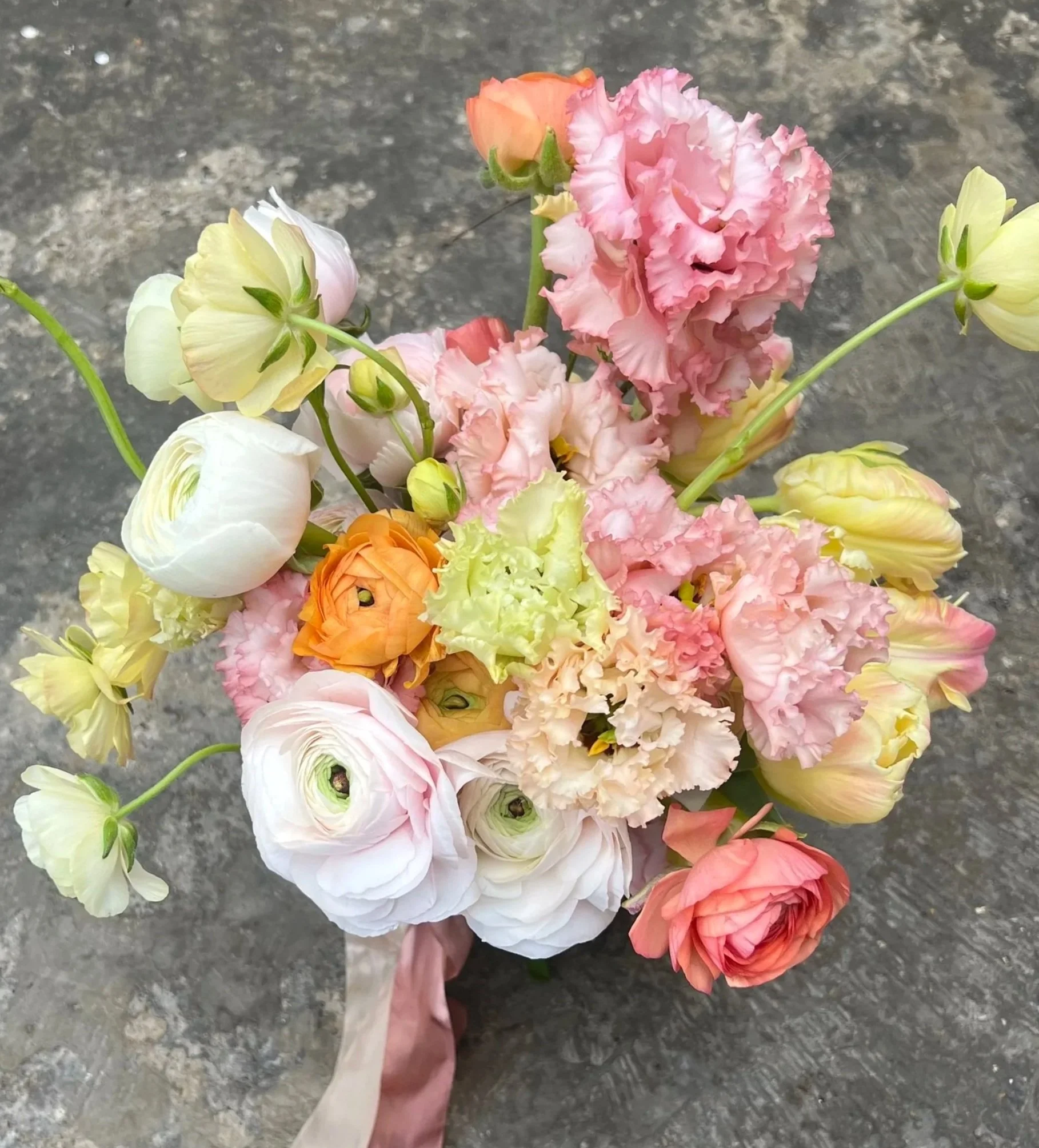 yellow, pink, peach and cream Spring bridal bouquet