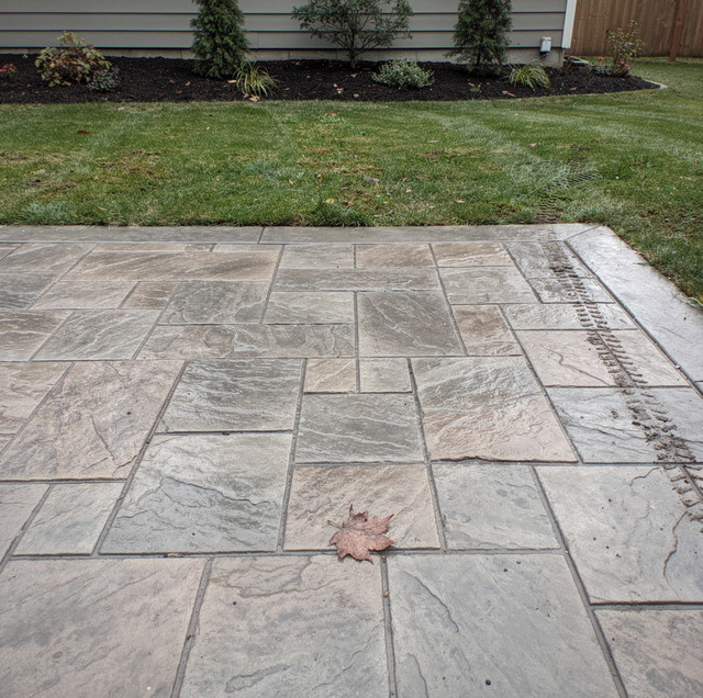 Freshly stamped concrete driveway with ashlar slate pattern