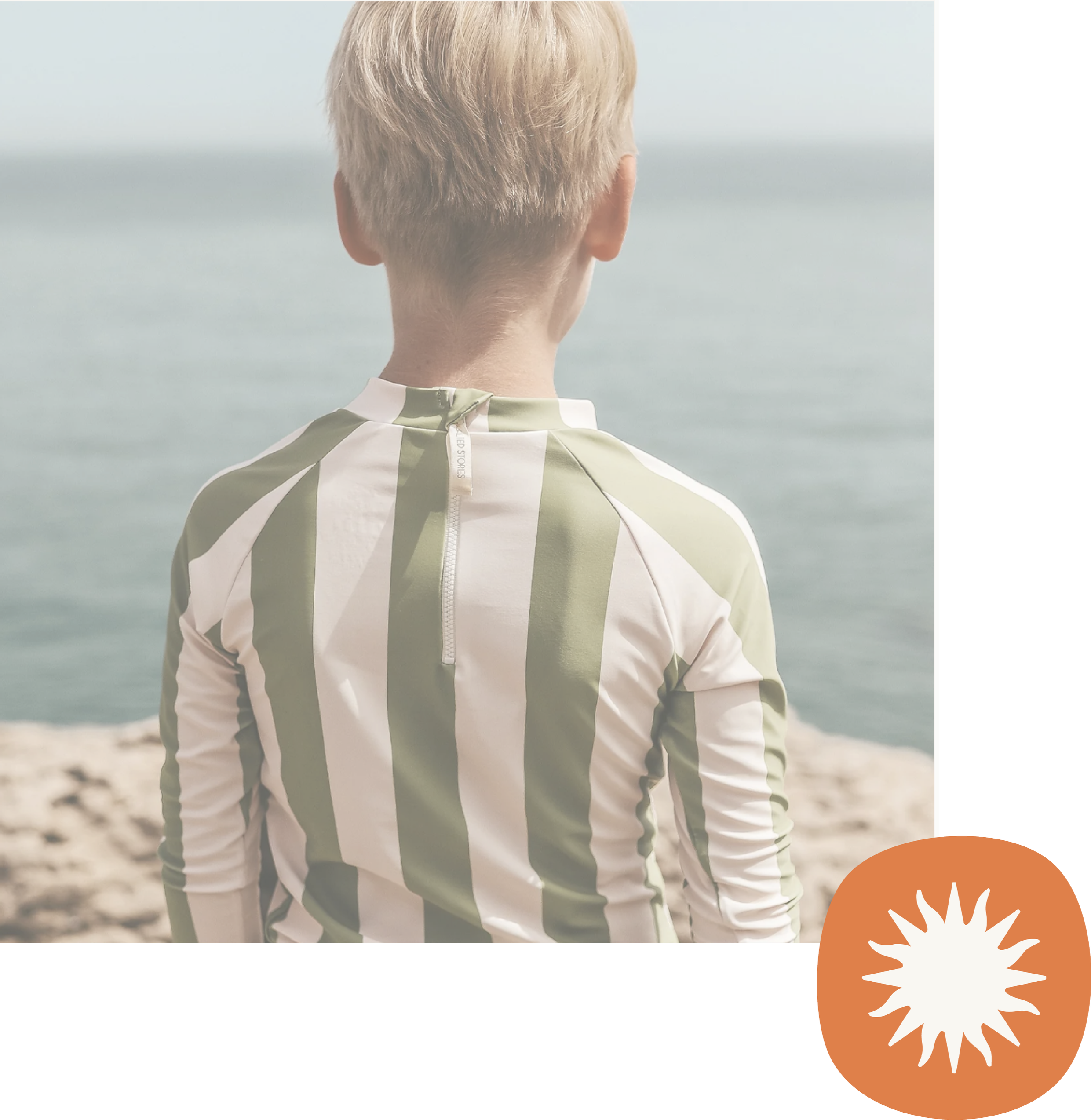Back view of a person with short blonde hair wearing a white and light green striped shirt, looking out over a body of water with a blurred horizon in the background.