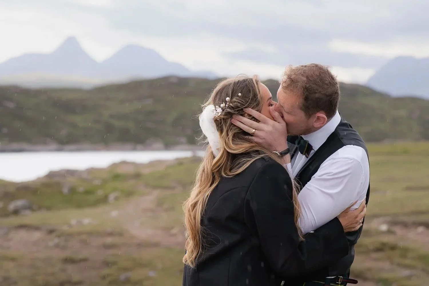 Groom kissing bride