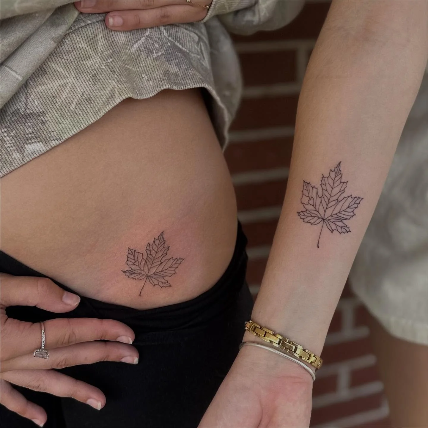 Matching cousins tattoos 🍁 #finelinetattoo #finelinetattooartist #mapleleaf #mapleleaftattoo #matchingtattoo #cutetattoo #lineworktattoo #leaftattoo #femaletattooartist