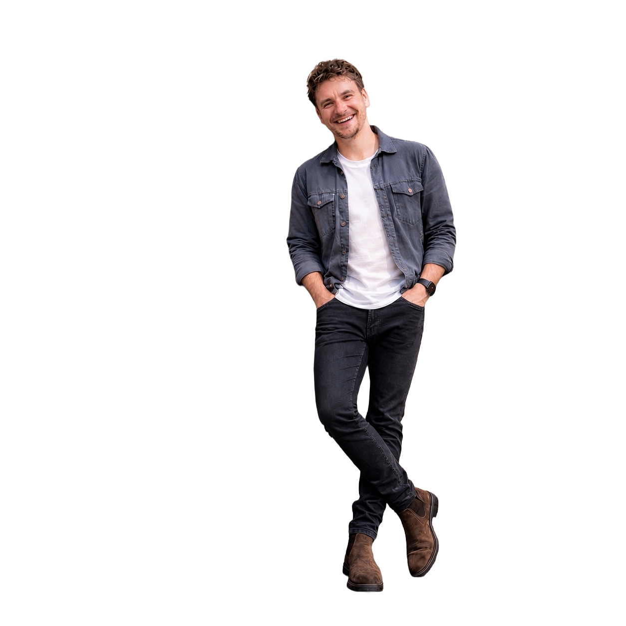 Tommy Pratt, founder and Head of Stuff at The Pratt Studios, smiling in a relaxed pose. The Pratt Studios is an architecture, interior design and aerial imaging studio working throughout London to the South West