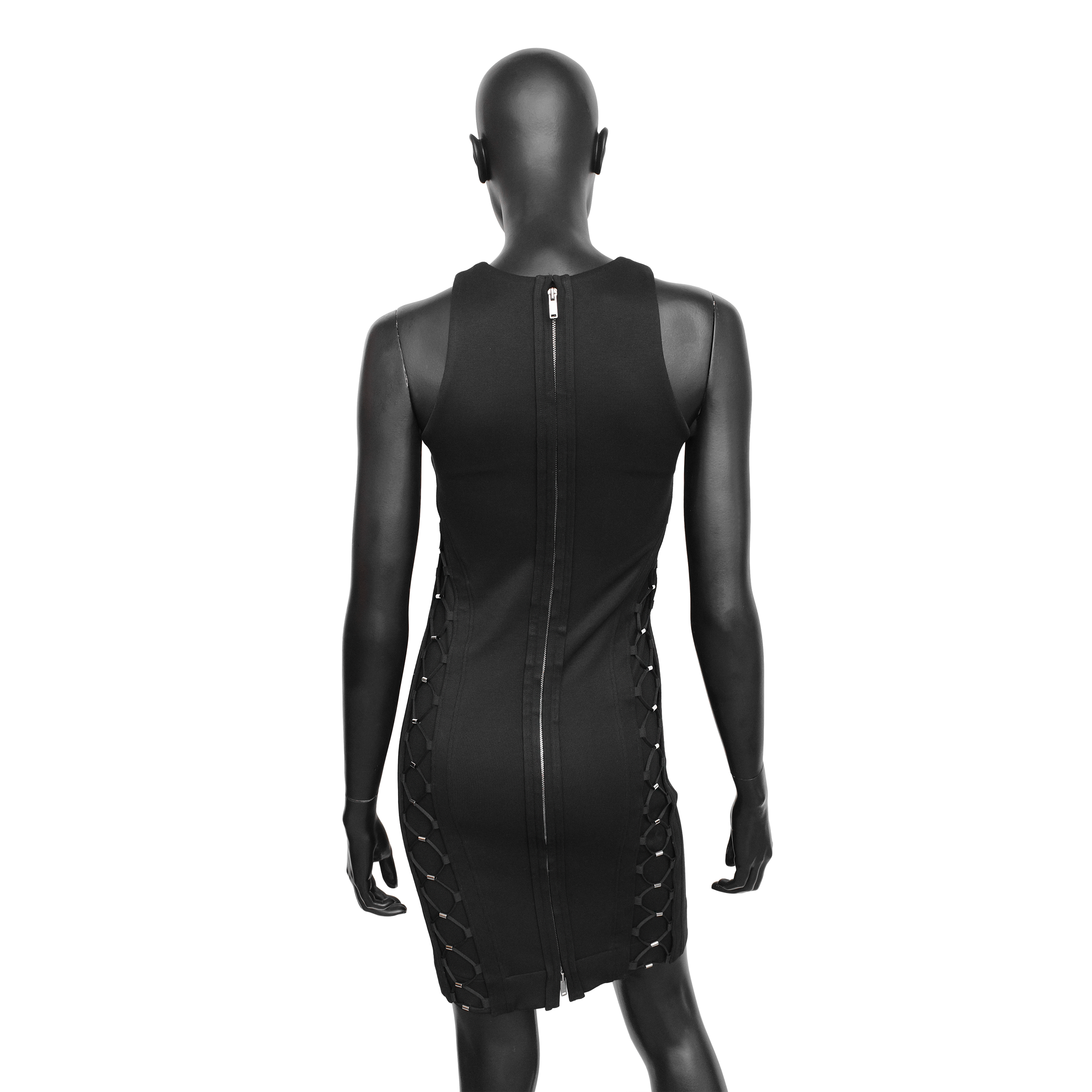 Gucci SS 2010 dress designed by Frida Giannini with bungee-inspired lace up detailing on the sides and upper chest. Size S. Available at Artefact Archive.