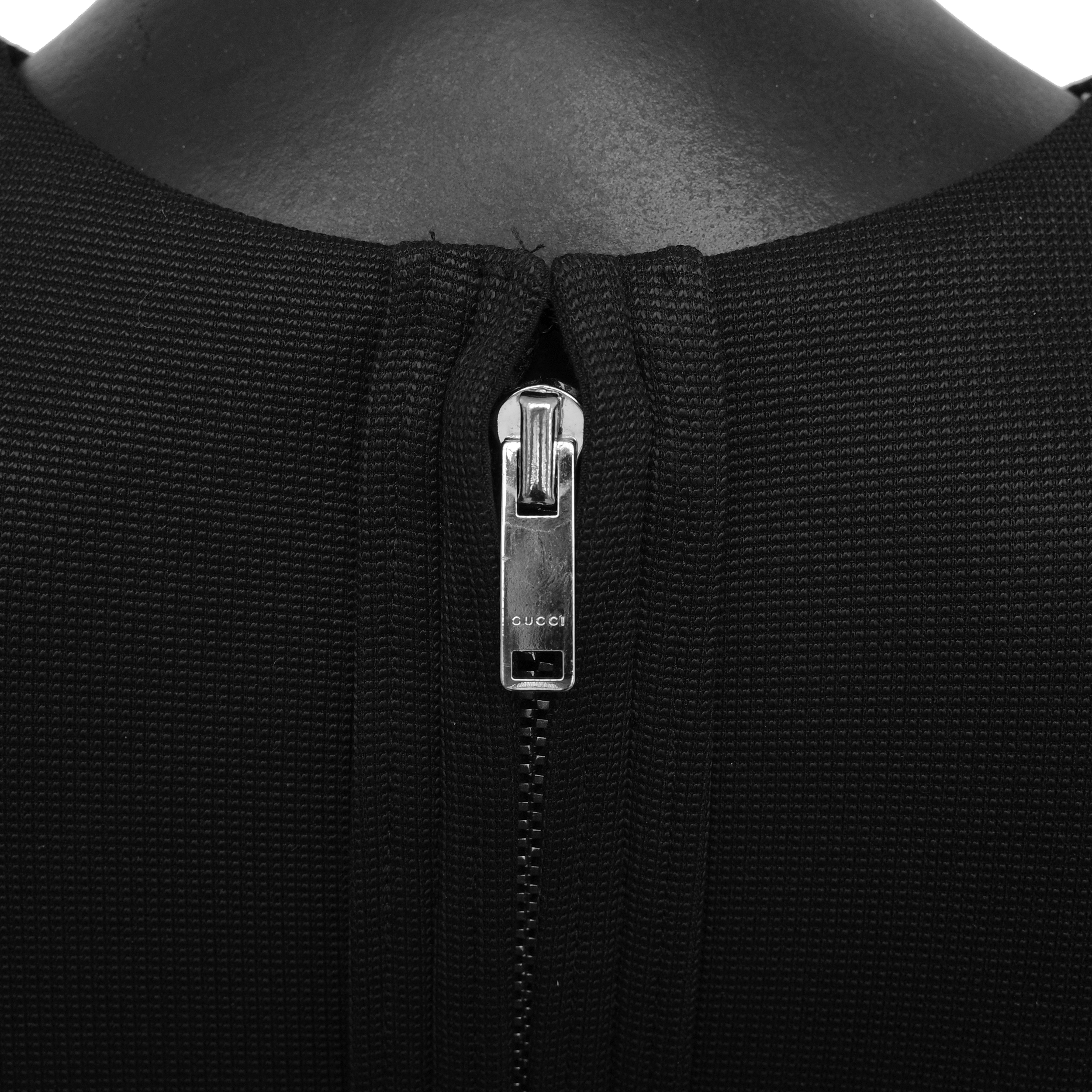 Gucci SS 2010 dress designed by Frida Giannini with bungee-inspired lace up detailing on the sides and upper chest. Size S. Available at Artefact Archive.