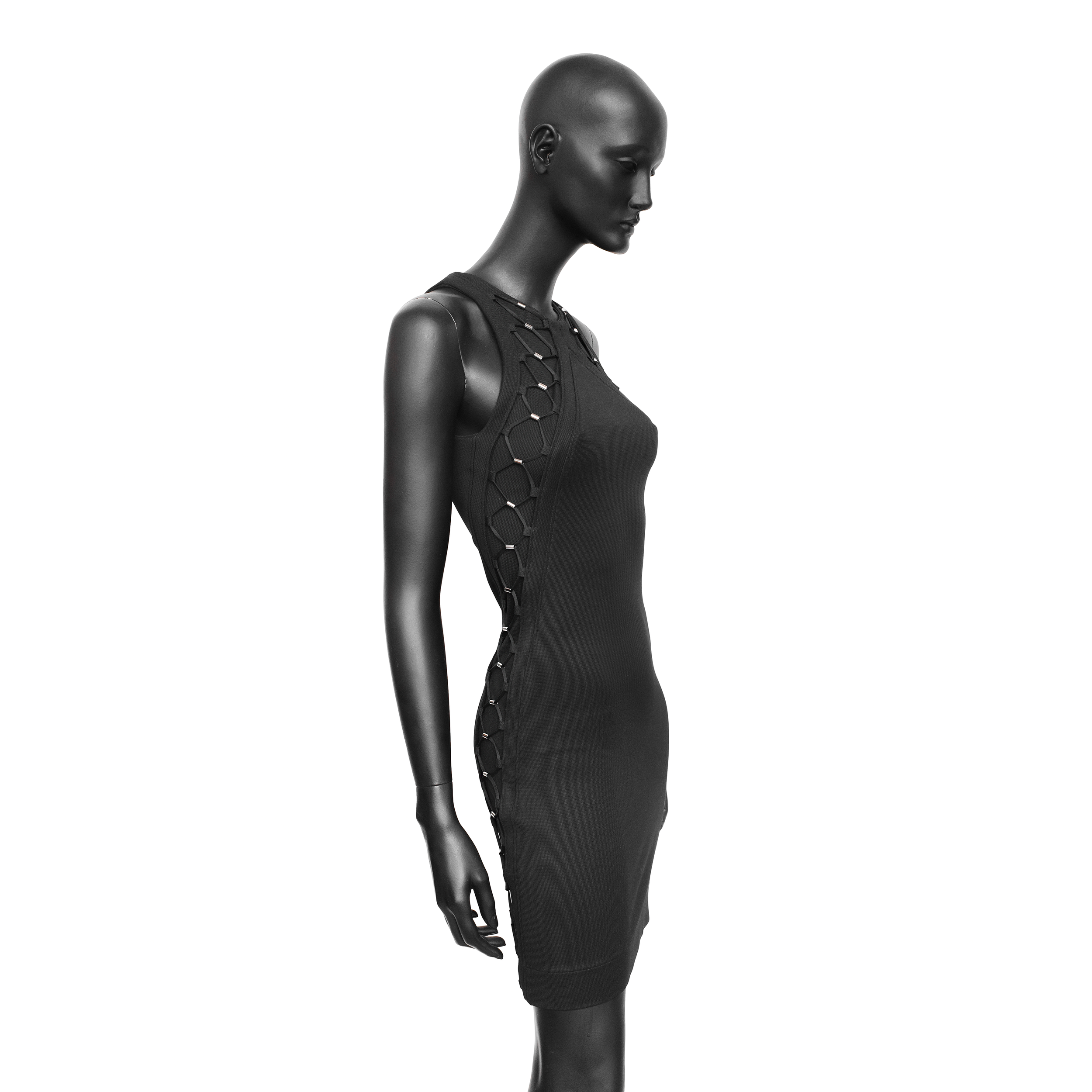 Gucci SS 2010 dress designed by Frida Giannini with bungee-inspired lace up detailing on the sides and upper chest. Size S. Available at Artefact Archive.