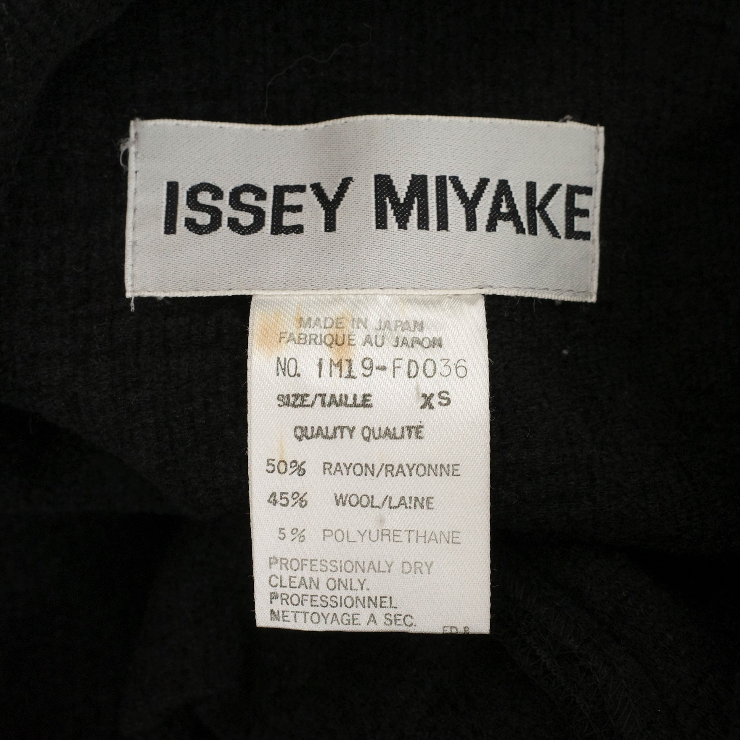 Issey Miyake FW 1991 runway multi-zip transformable jacket with subtle shoulder pads and hidden front side pockets, size XS, available at Artefact Archive