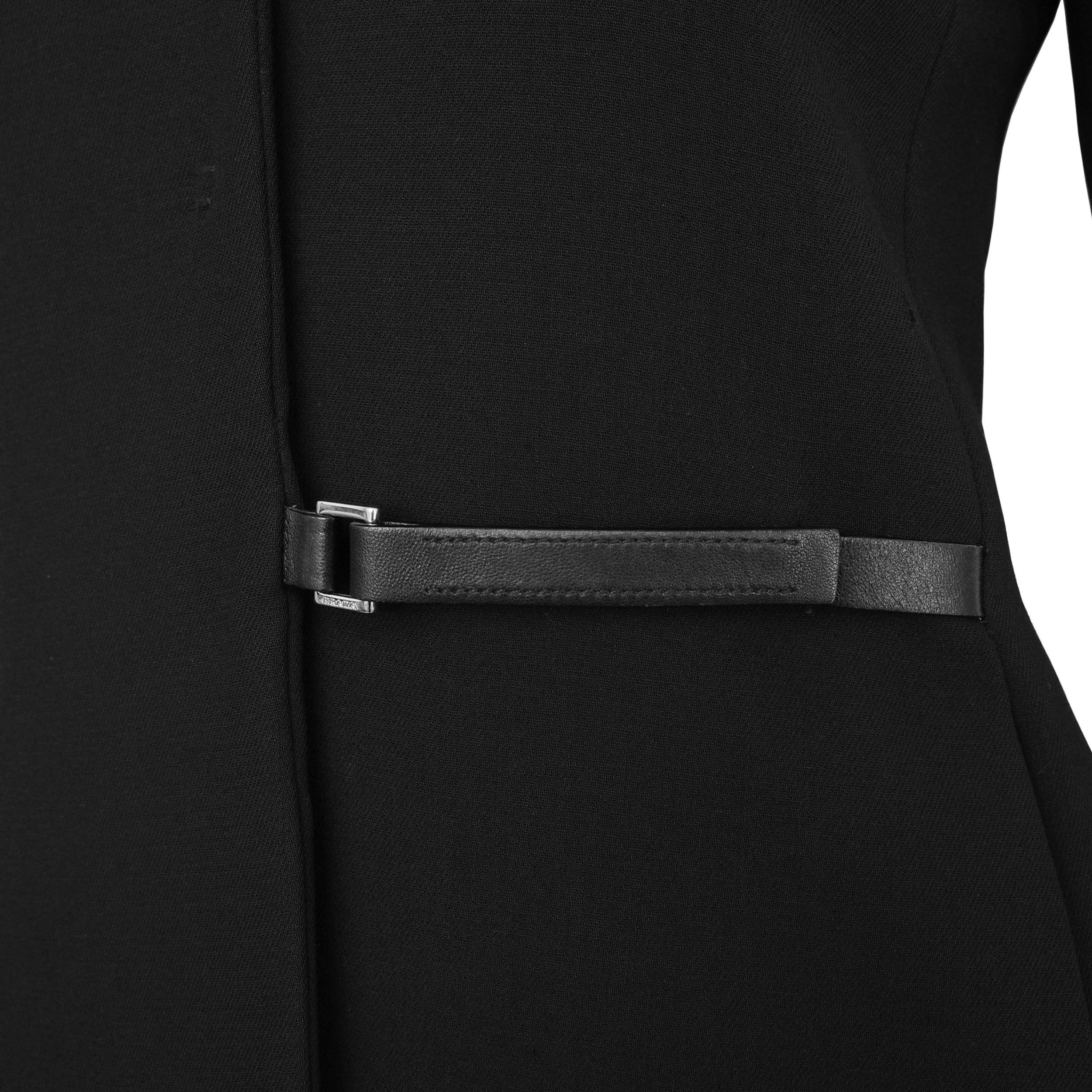 Prada FW 1999 wool blazer with a leather buckle strap velcro closure and leather trims. Size IT 40 / UK 8. Available at Artefact Archive.