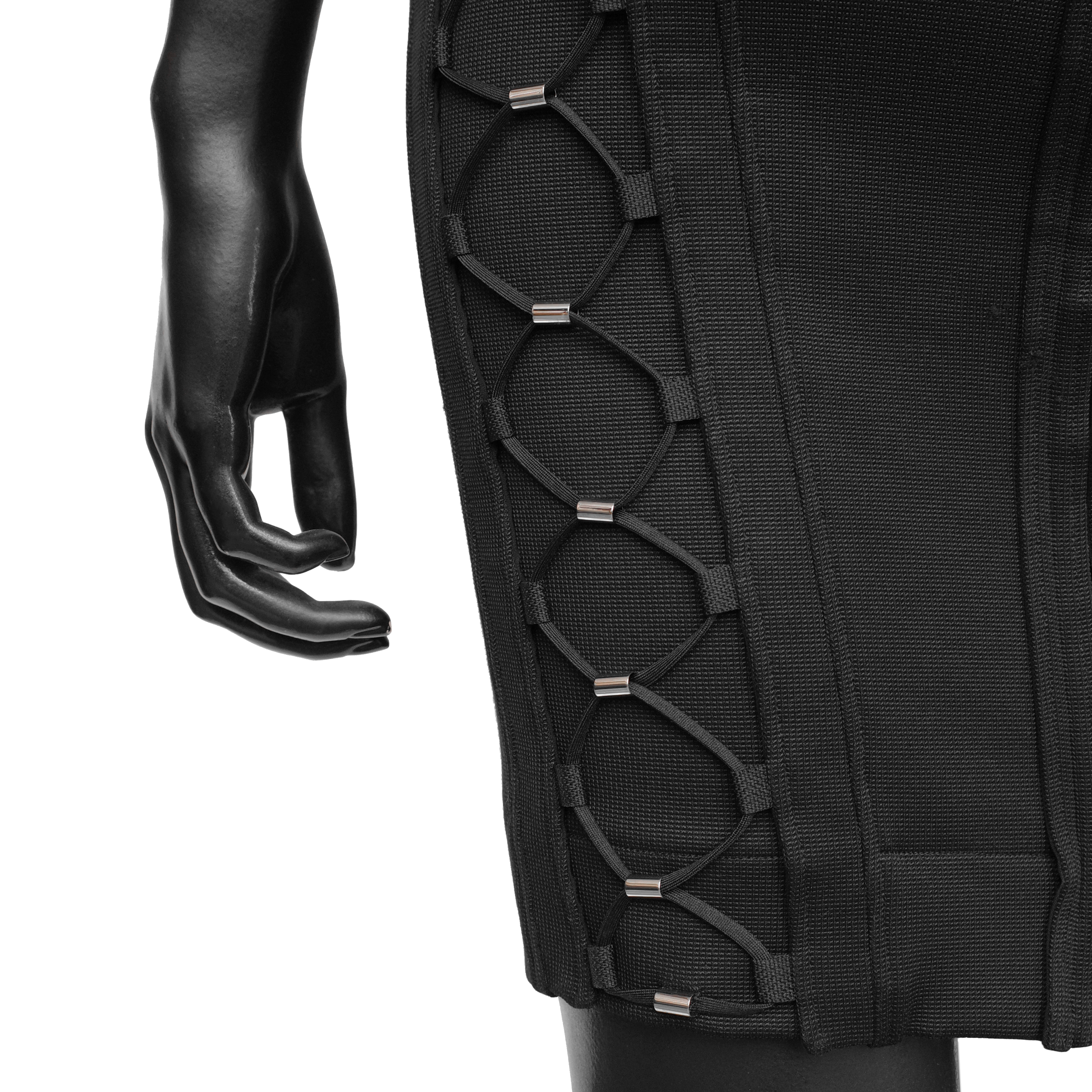 Gucci SS 2010 dress designed by Frida Giannini with bungee-inspired lace up detailing on the sides and upper chest. Size S. Available at Artefact Archive.
