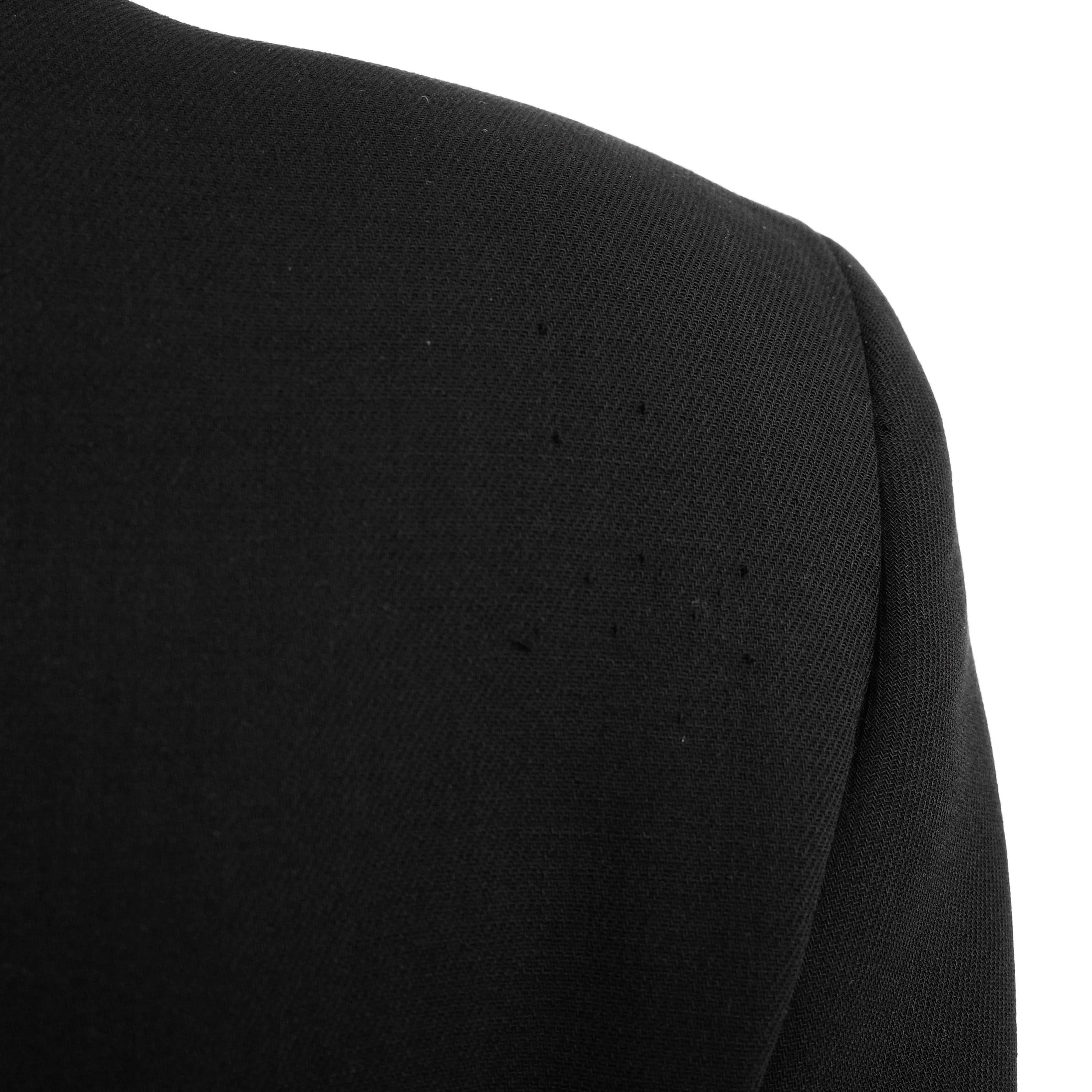 Prada FW 1999 wool blazer with a leather buckle strap velcro closure and leather trims. Size IT 40 / UK 8. Available at Artefact Archive.