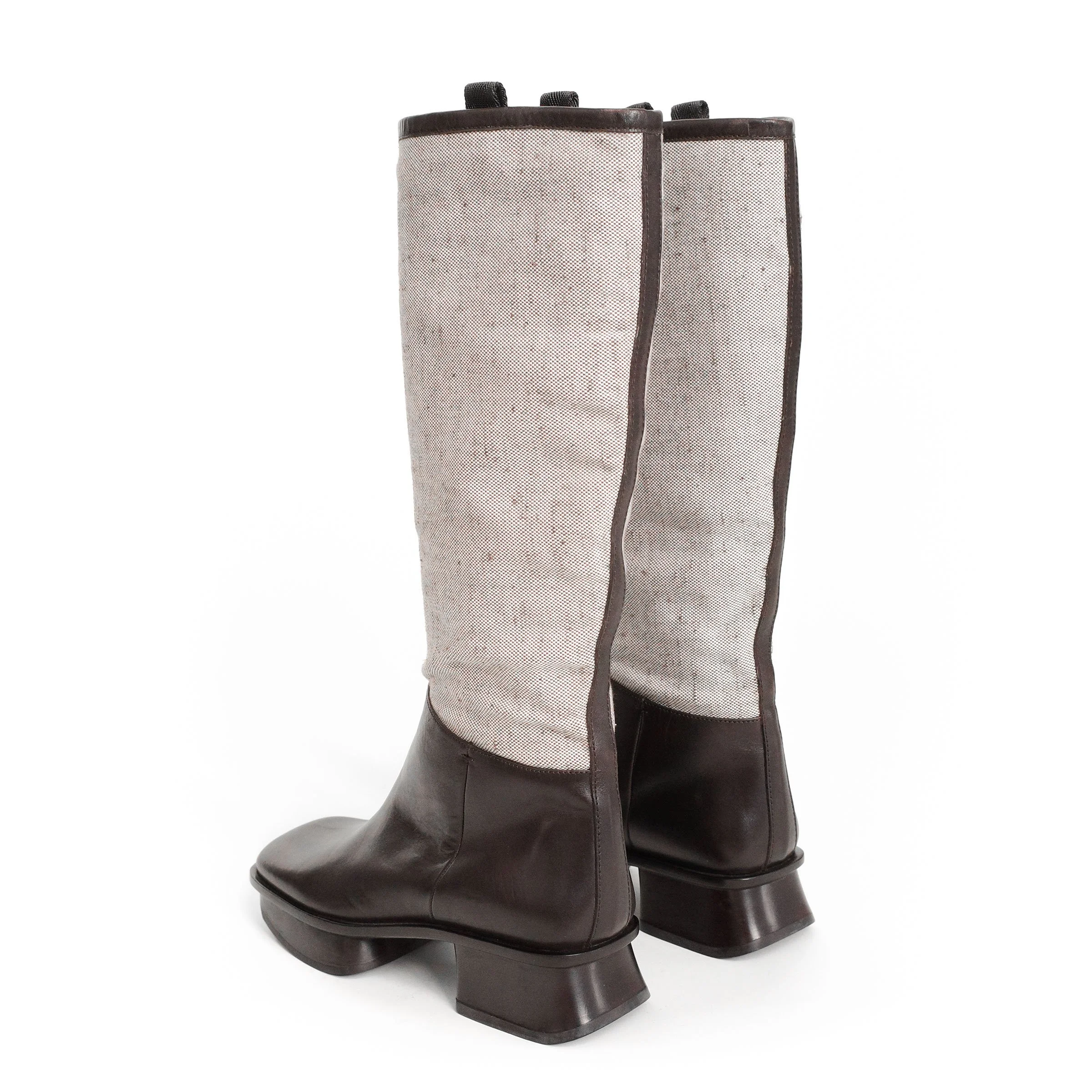 Prada SS 1999 split sole knee boots composed of canvas and leather. Size EU 37 / UK 4. Available at Artefact Archive.