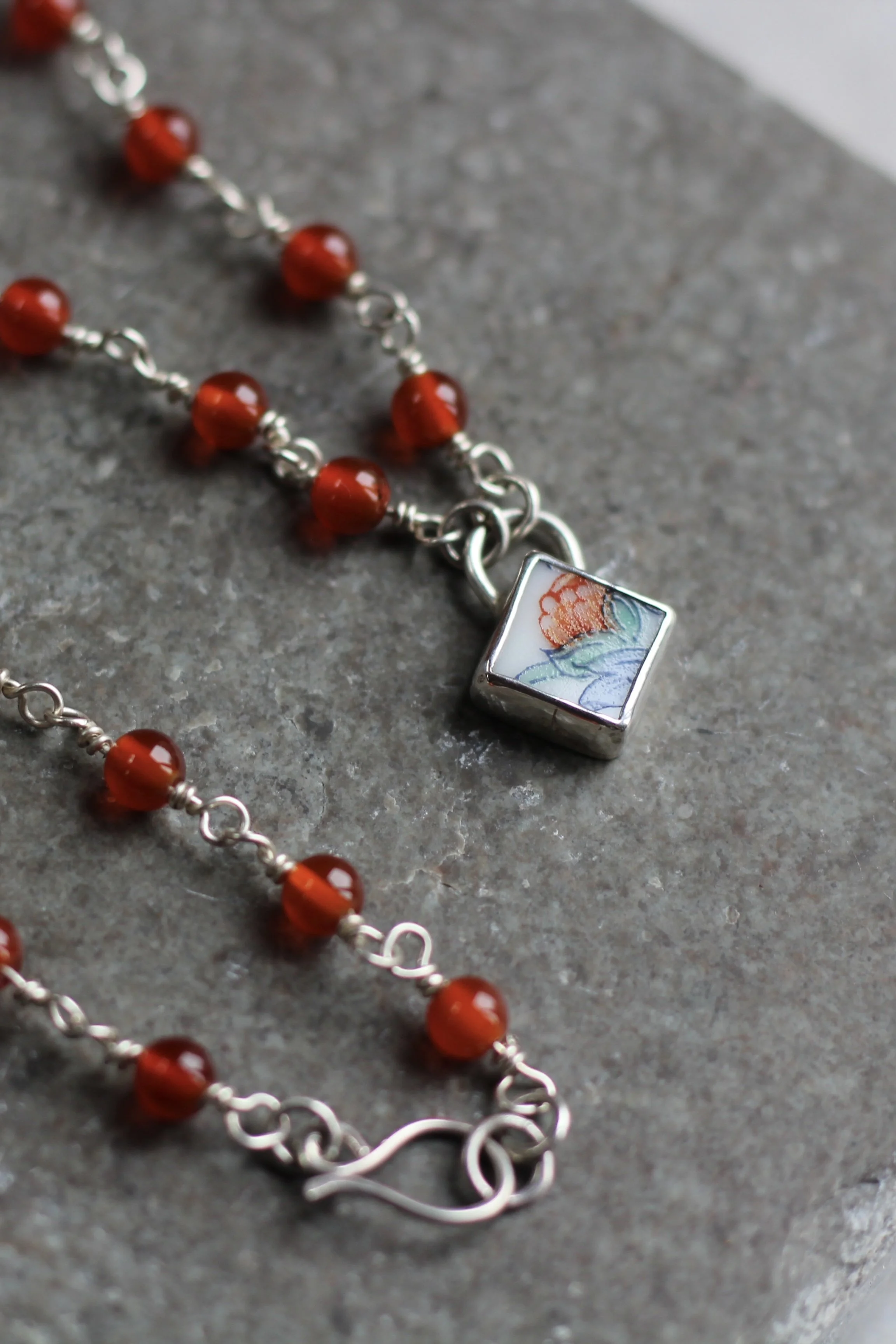 Carnelian beaded necklace with Pottery Pendant