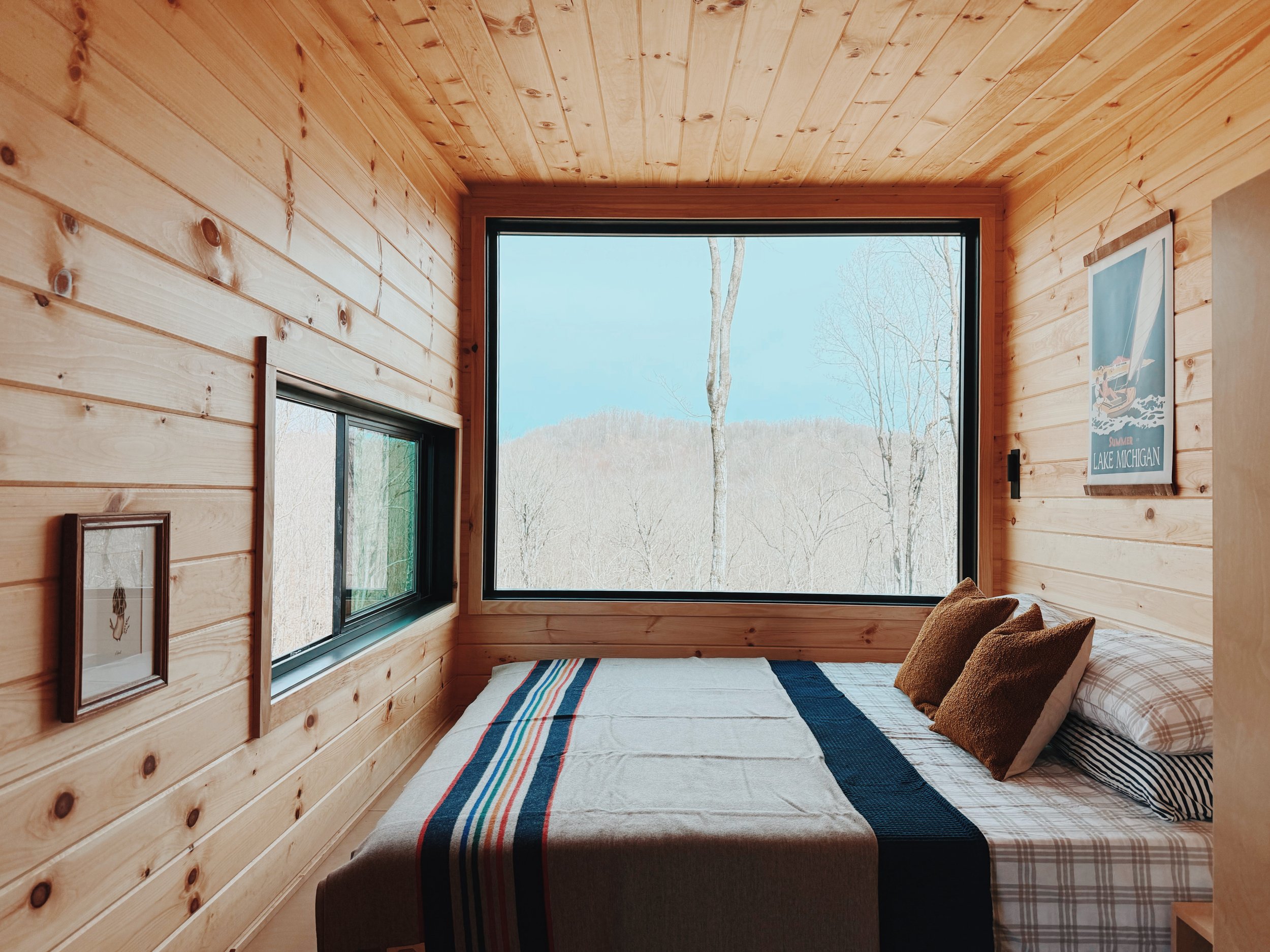 glamping cabin with king bed and view
