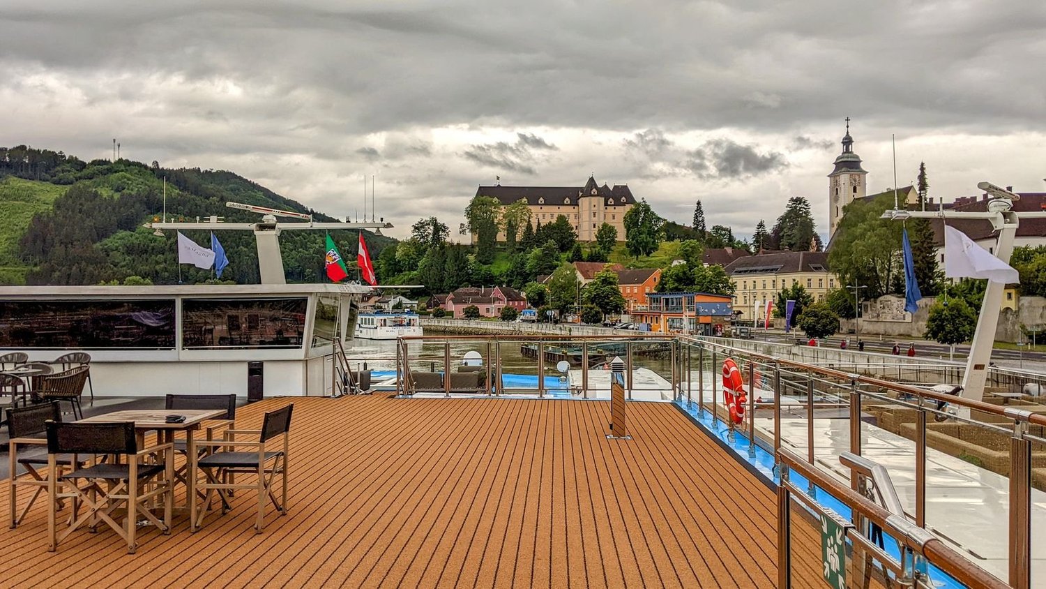 Sun deck with castle backdrop, Grein, Danube