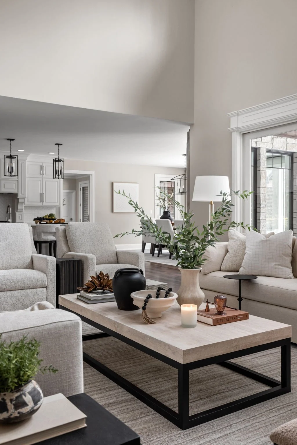 Modern living room with beige furniture and styled coffee table Leytonstone