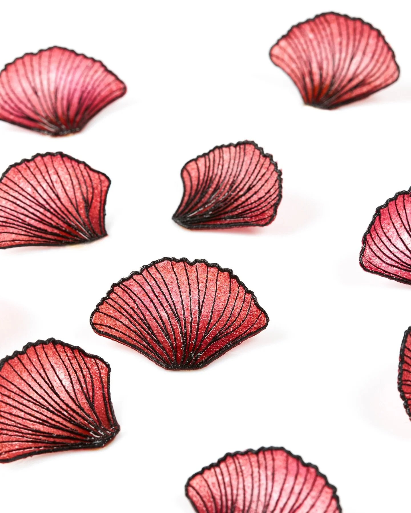 The fins - pressed, shaped and crisped by @christian_wellendorf into something that took far more patience than it looks. Each one made by hand. Each one unrepeatable.

The fin of the Red Gurnard, reimagined through the soil. 🔴