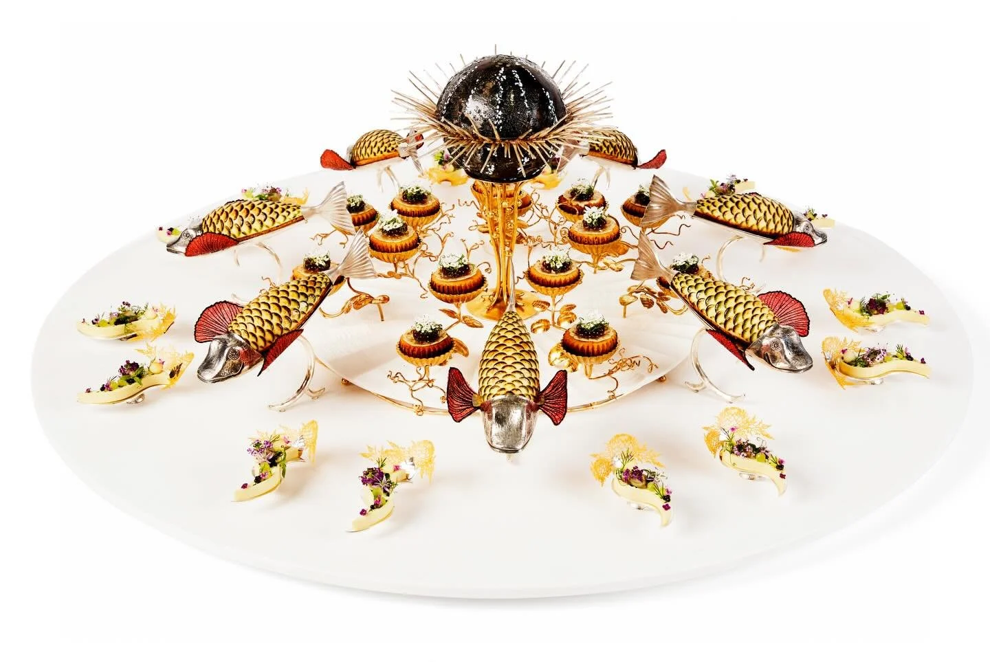 The platter in all it&rsquo;s glory 🌟

An artichoke shell meeting Danish smoked cheese and spring herbs. A savoury &AElig;bleskive - crisp chickpea, mushroom pearls. Red gurnard, oven-baked, with its edible fin shaped by hand.