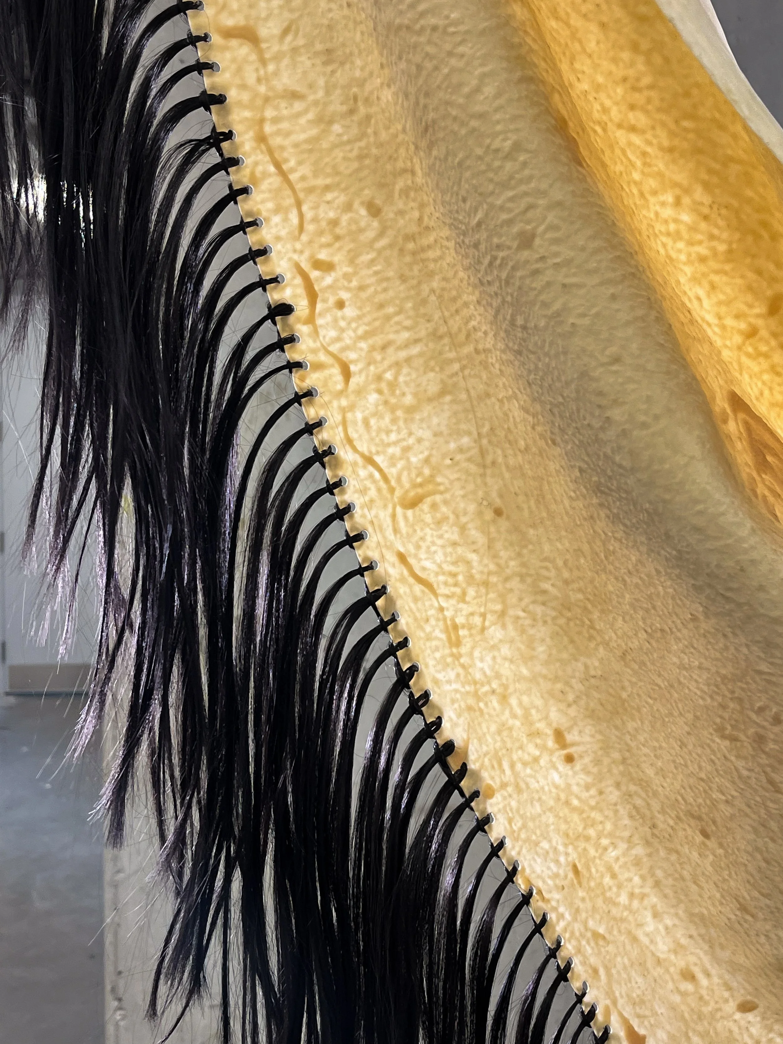 Close-up of Manton de 
Latex and synthetic hair, 6 X 3.5 feet, 2025  