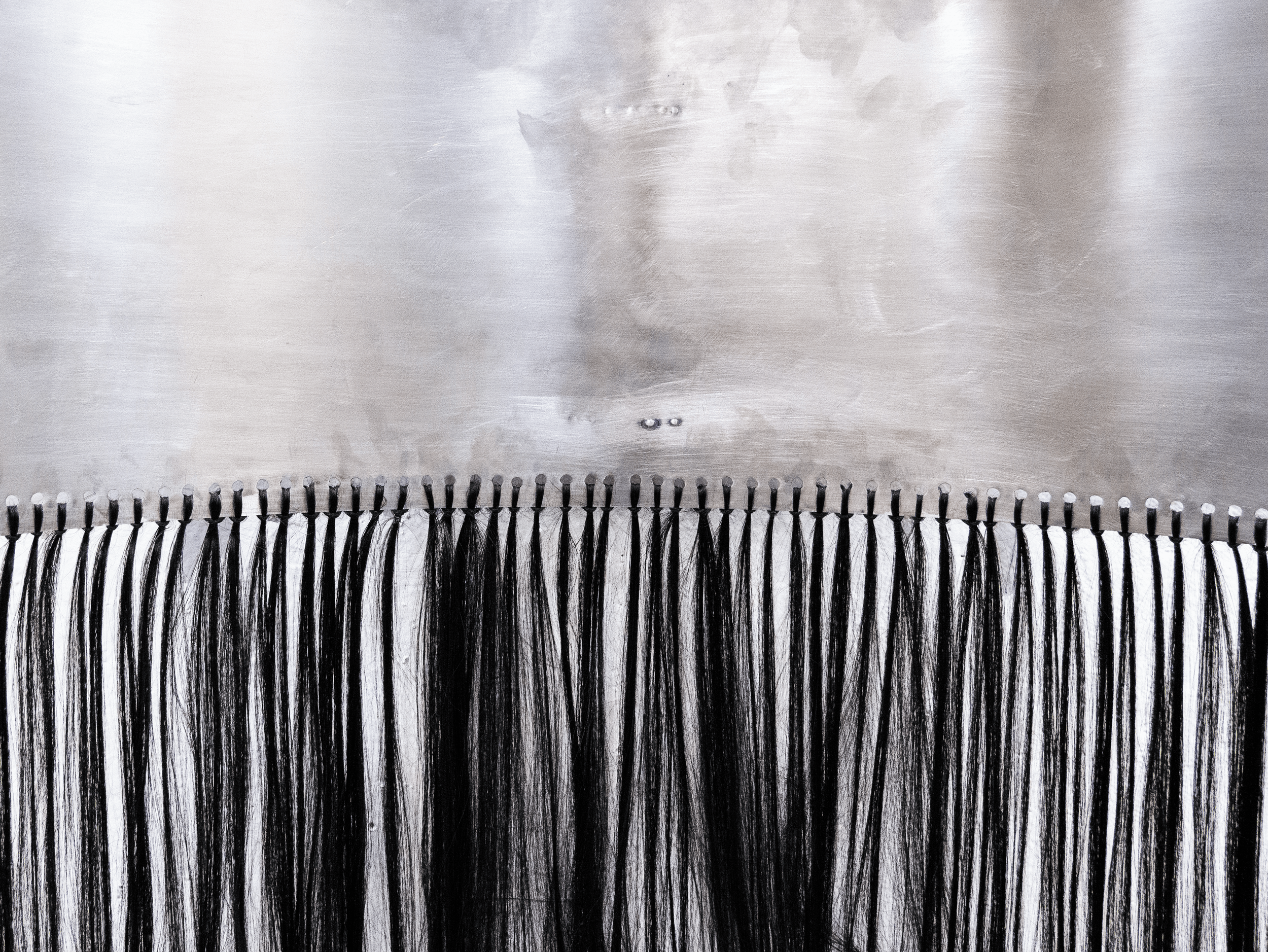 FIGURE #1 
Steel and synthetic hair.
4 x 1-foot steel sheets. 