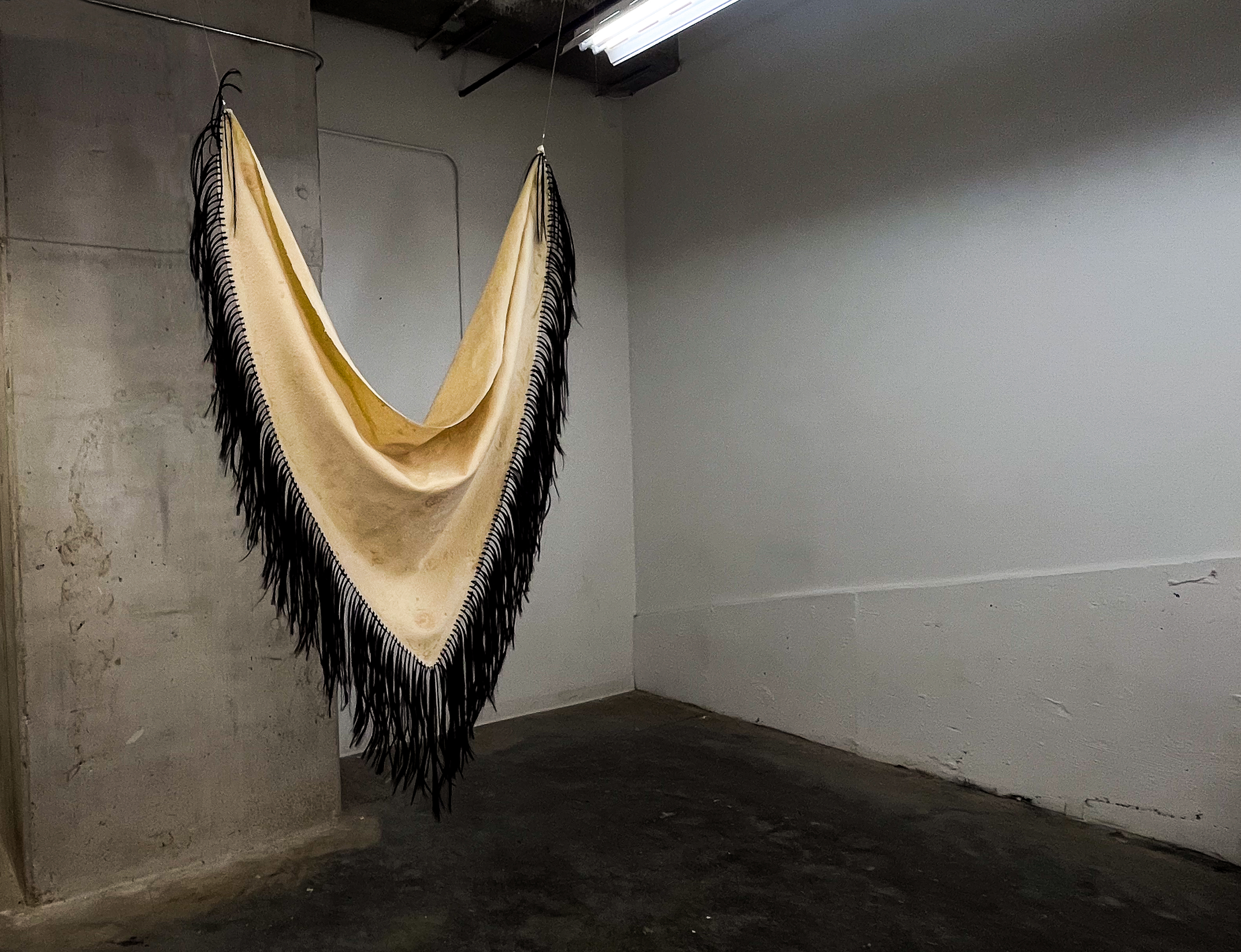 Manton de 
Latex and synthetic hair, 6 X 3.5 feet, 2025  
