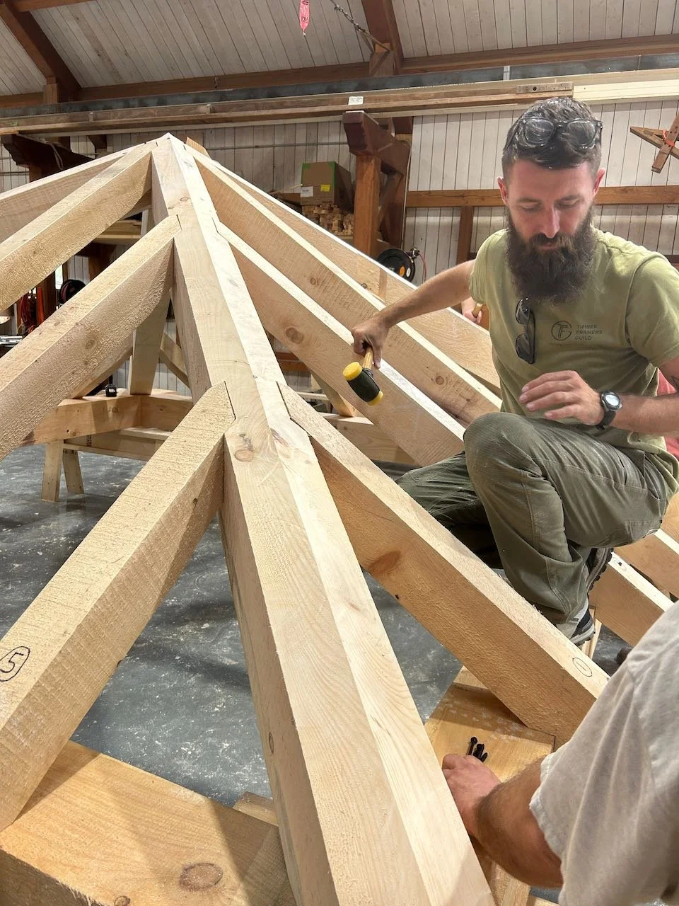 Student puts finishing touches on hip roof