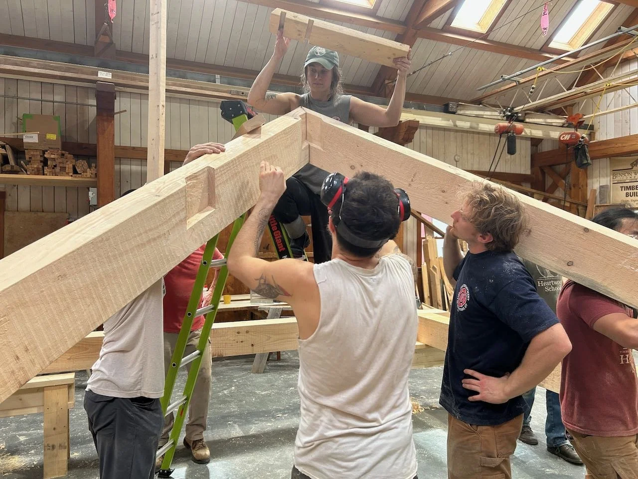 Students assemble timber frame