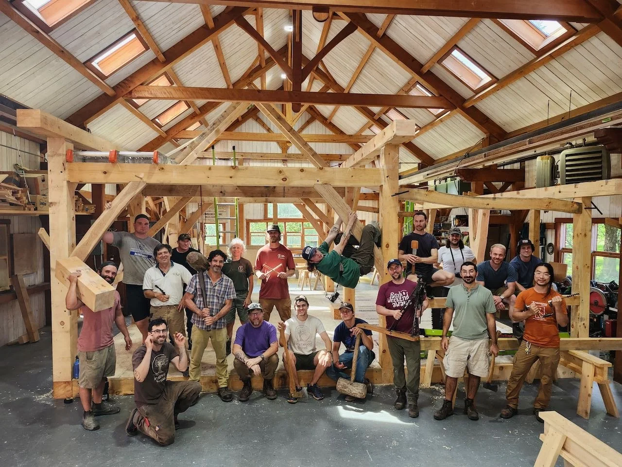 Class photo in completed timber frame