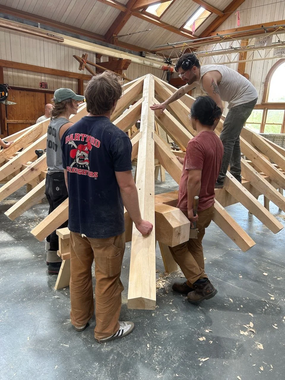 Students complete hip roof