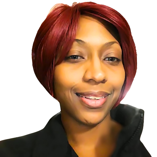 Person with short red hair smiling