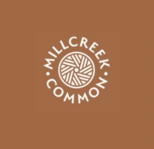 Milllcreek Common logo with a circular yarn ball design in the center on a brown background.