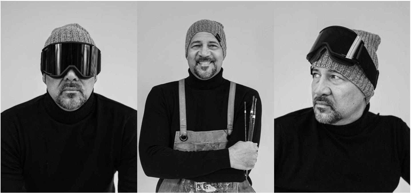 Three black-and-white photos of man with gray beard, wearing beanie and turtleneck, in different poses, with one in sunglasses and ski goggles, holding art brushes in one hand.