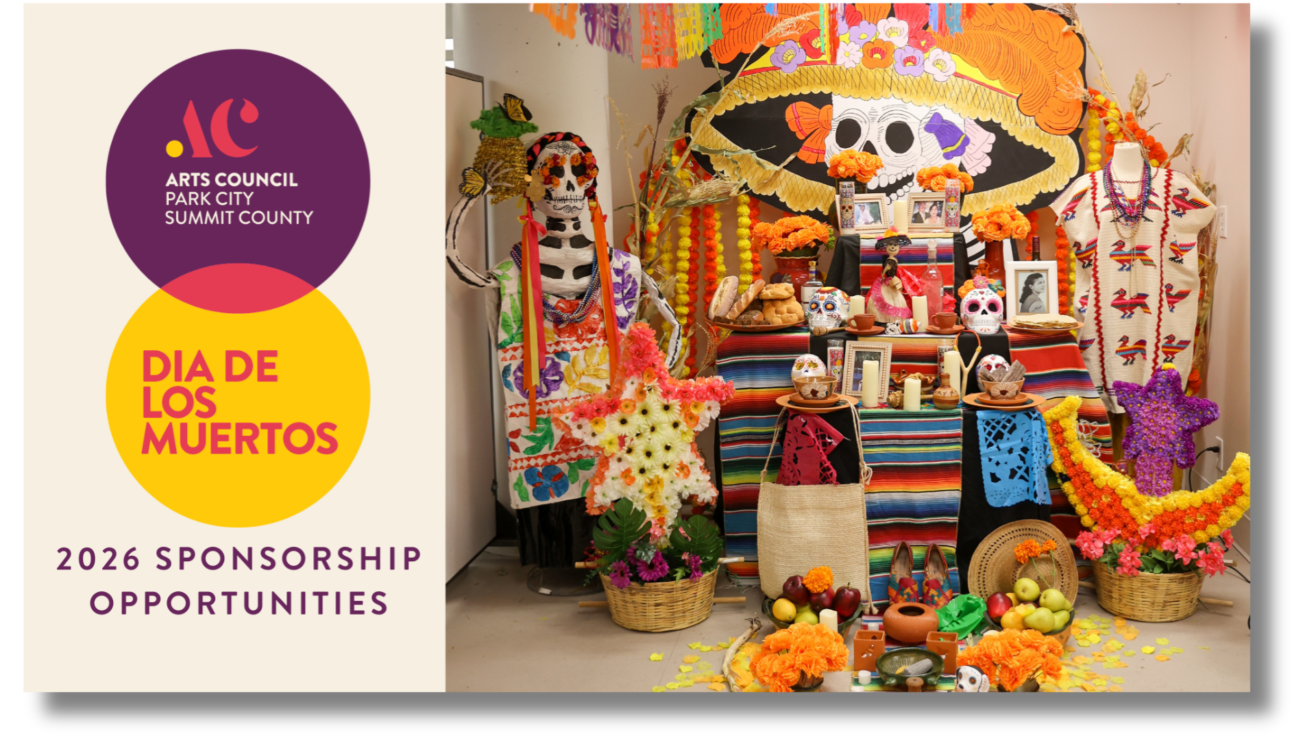 Day of the Dead altar decorated with colorful flowers, skull motifs, photos, candles, and traditional Mexican ornaments. The left side features logos of Arts Council and a text announcing sponsorship opportunities for 2026.