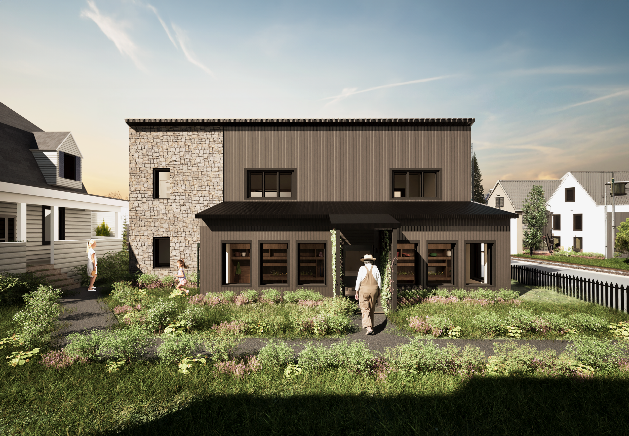 A modern two-story house with a black exterior, large front windows, a porch, and a stone accent wall on one side, surrounded by a garden with green plants and flowers, and three people walking or standing outside.