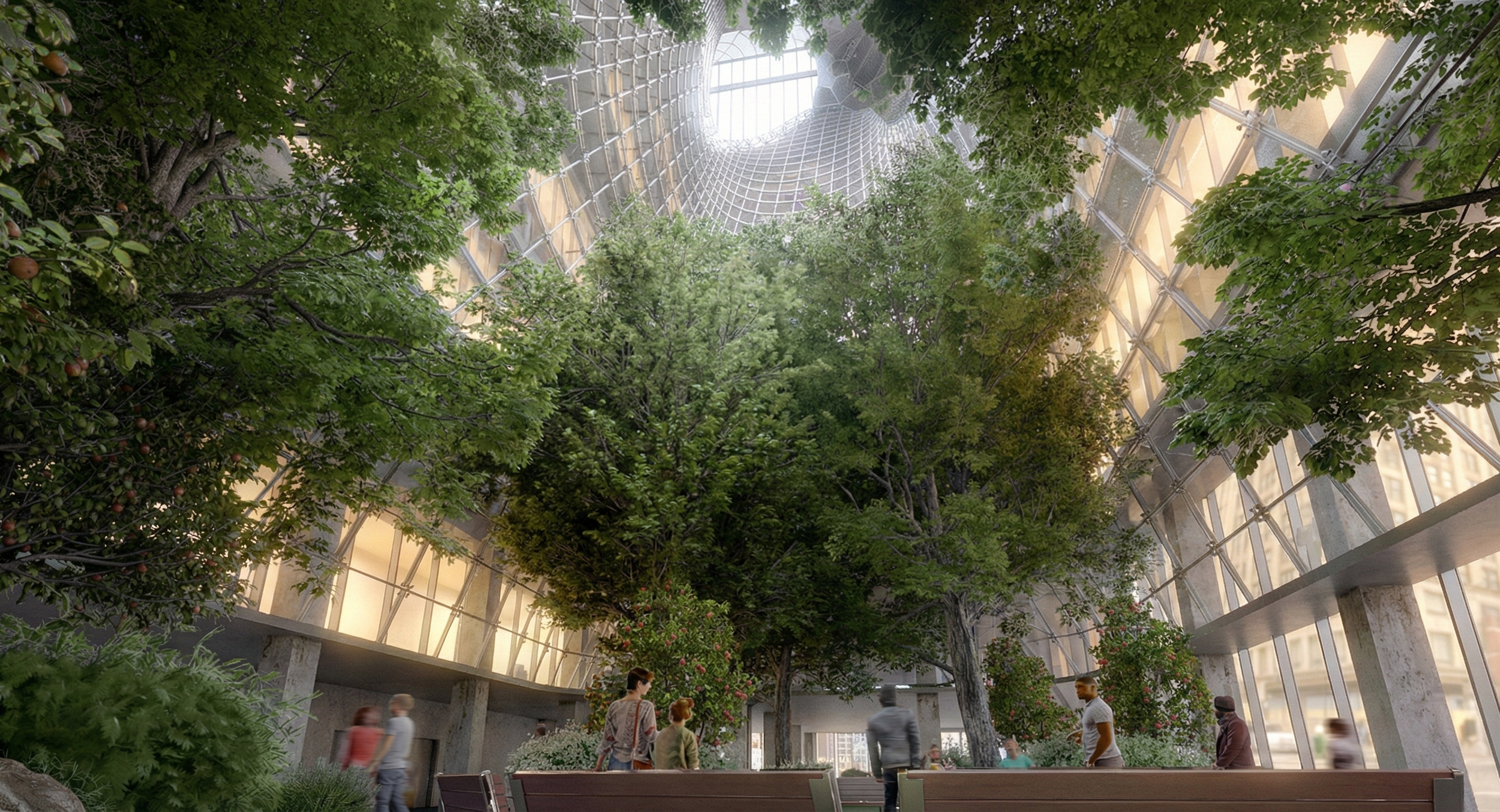 Indoor botanical garden with large trees, plants, and people walking and sitting in the space, surrounded by floor-to-ceiling glass windows and a glass ceiling.