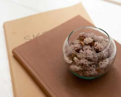 stack of books in a calm home setting
