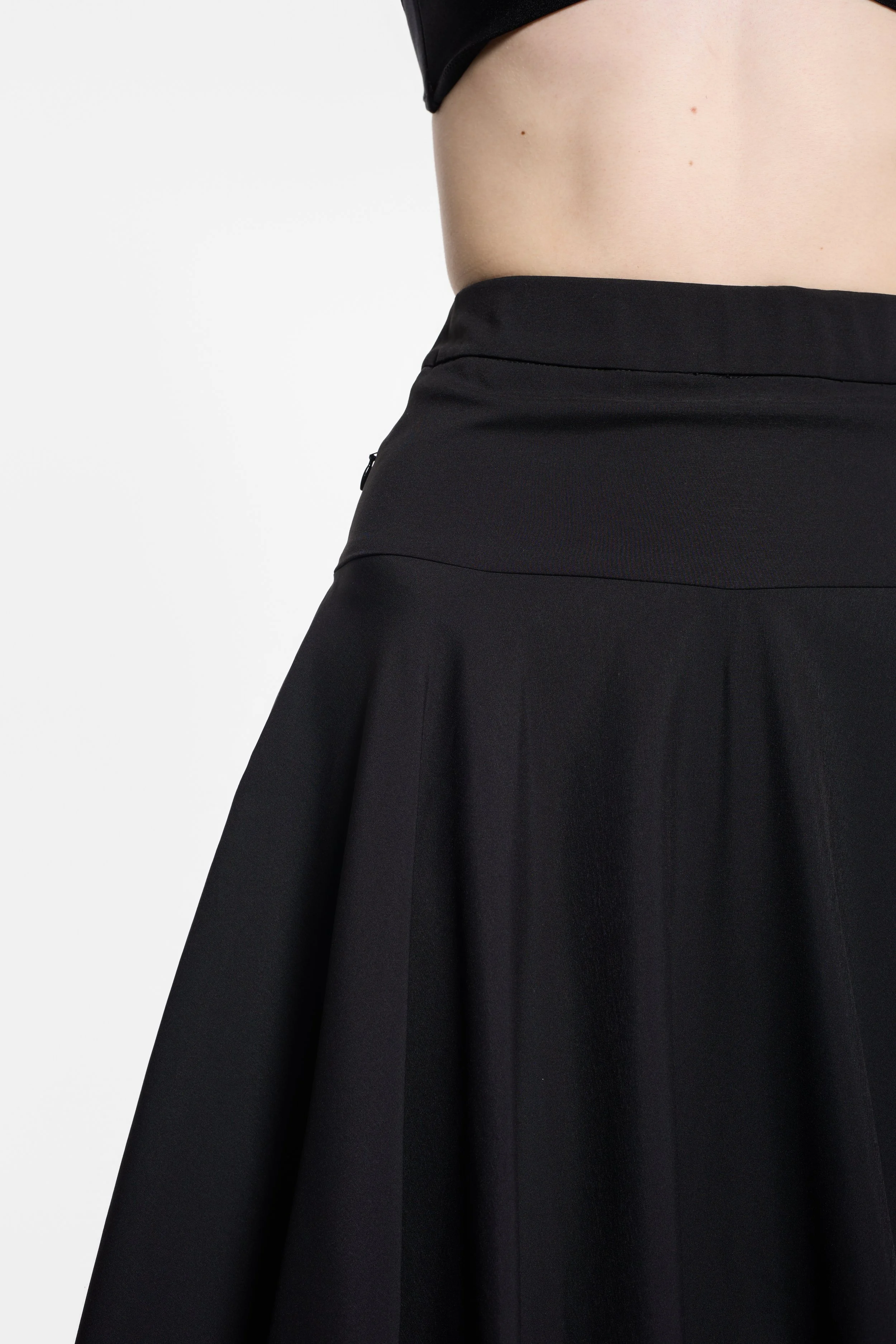 Close-up of structured waistband and concealed fastening on UN3D skirt