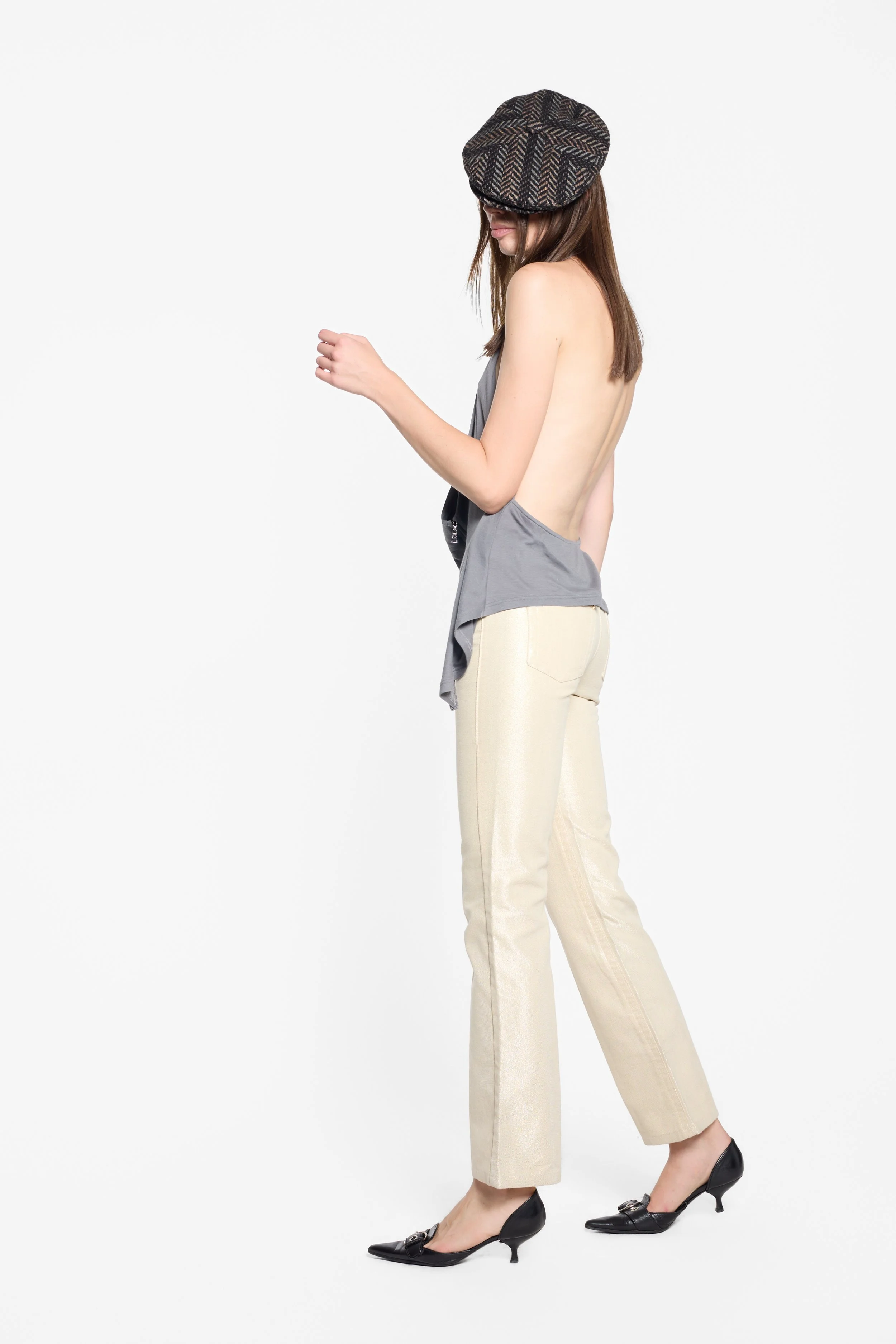 Roberto Cavalli 2007 champagne metallic jeans styled on model, full-length editorial image