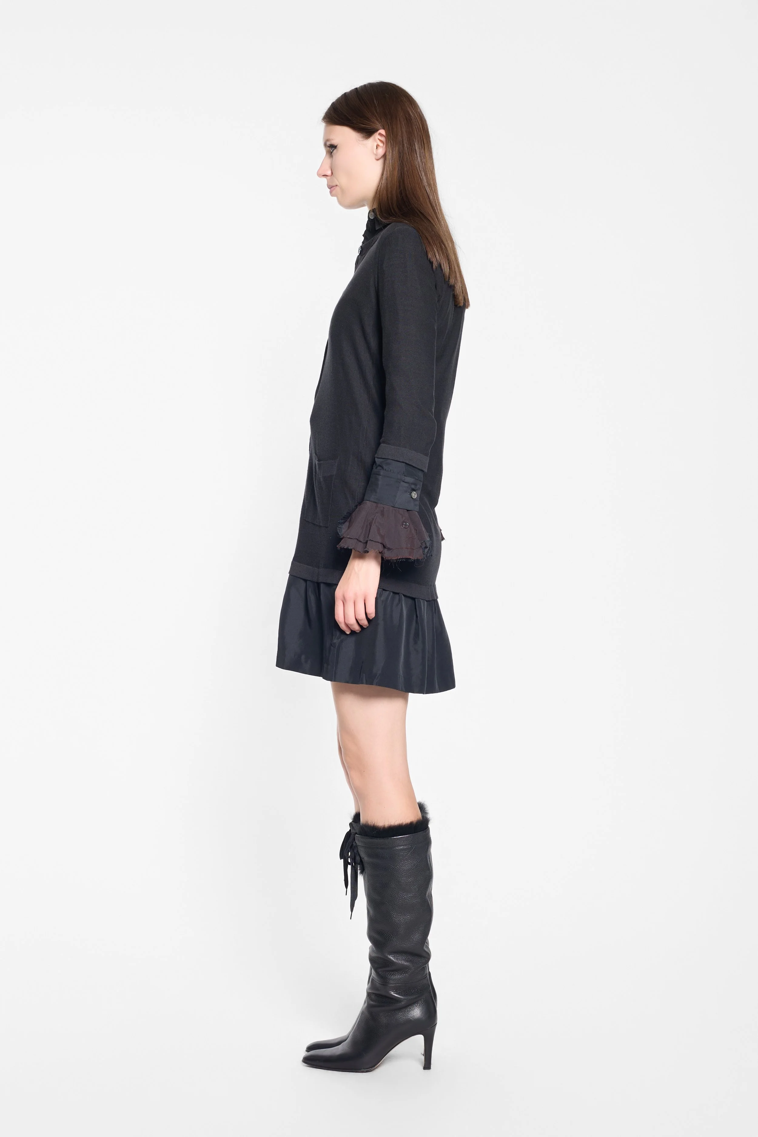 Side view of Sonia Rykiel black knit mini dress