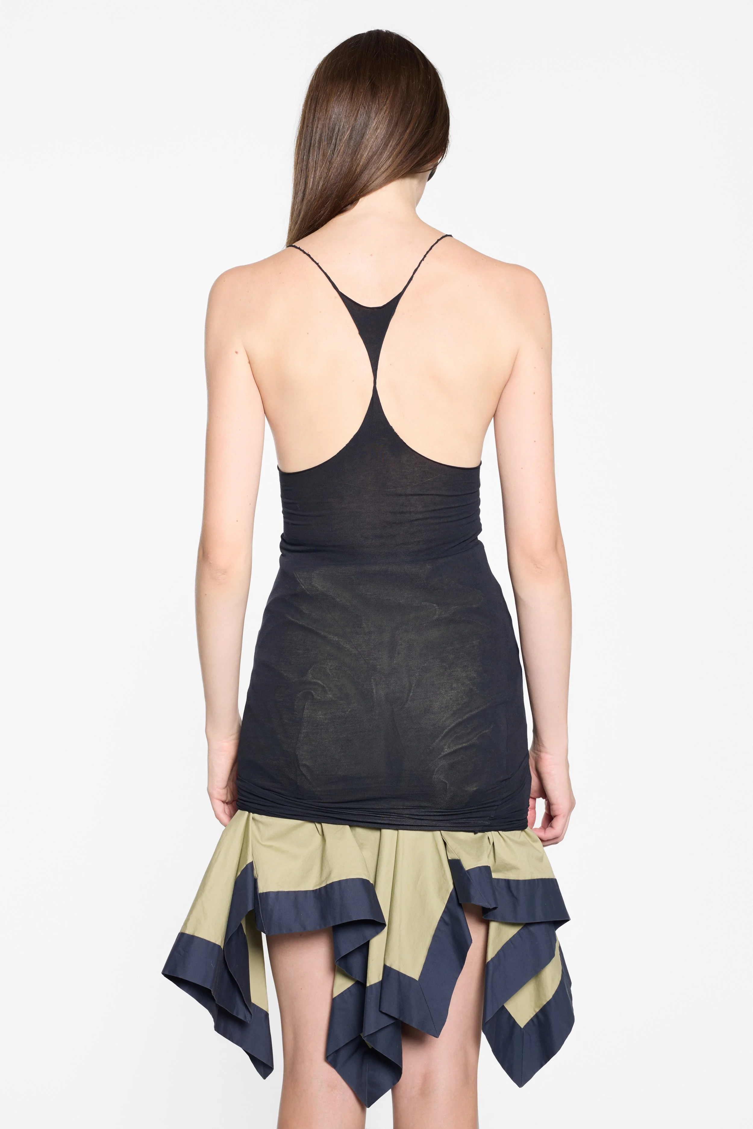Vivienne Westwood olive asymmetric skirt styled on model, back side view with Janus tank top