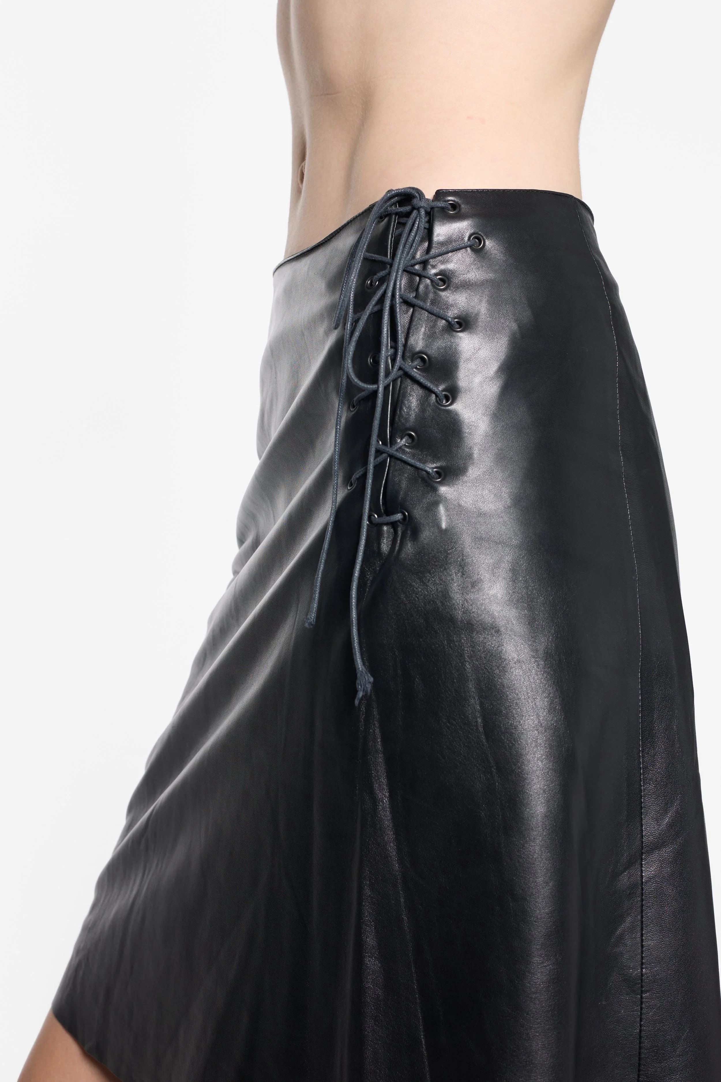 Plein Sud black leather skirt, front draping and leather finish detail
