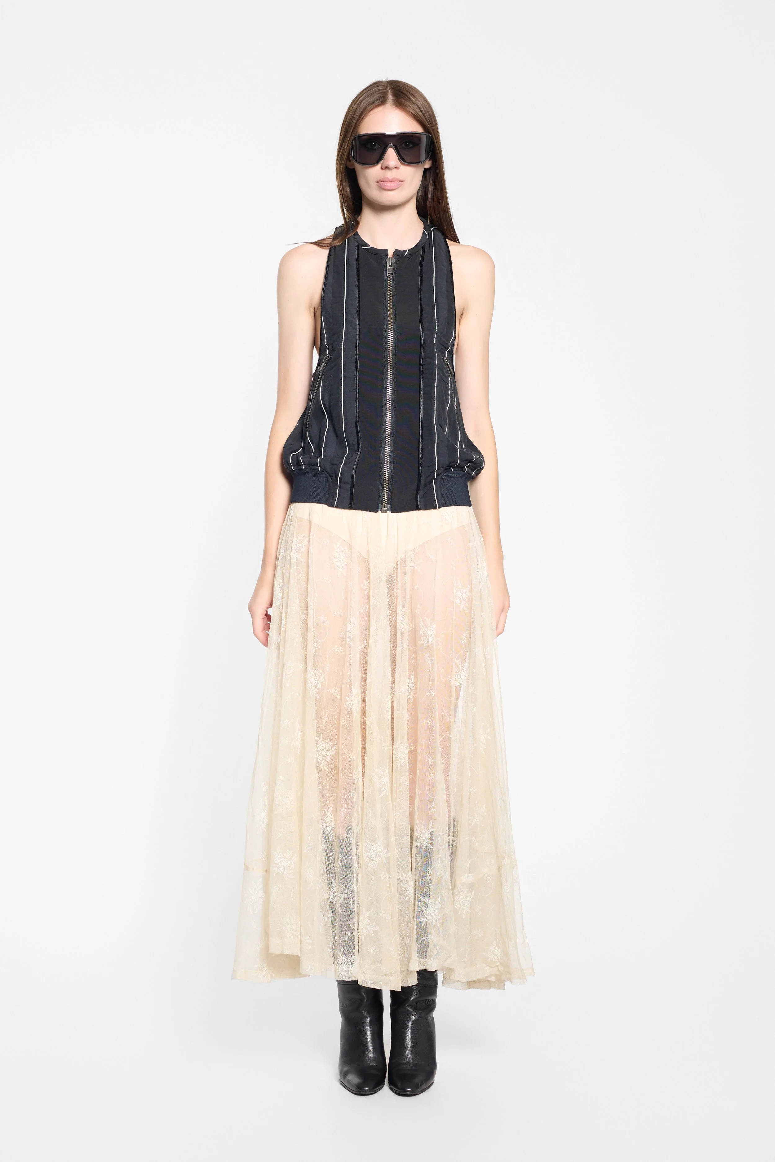Haider Ackermann SS18 black pinstripe zip vest worn on model, front view