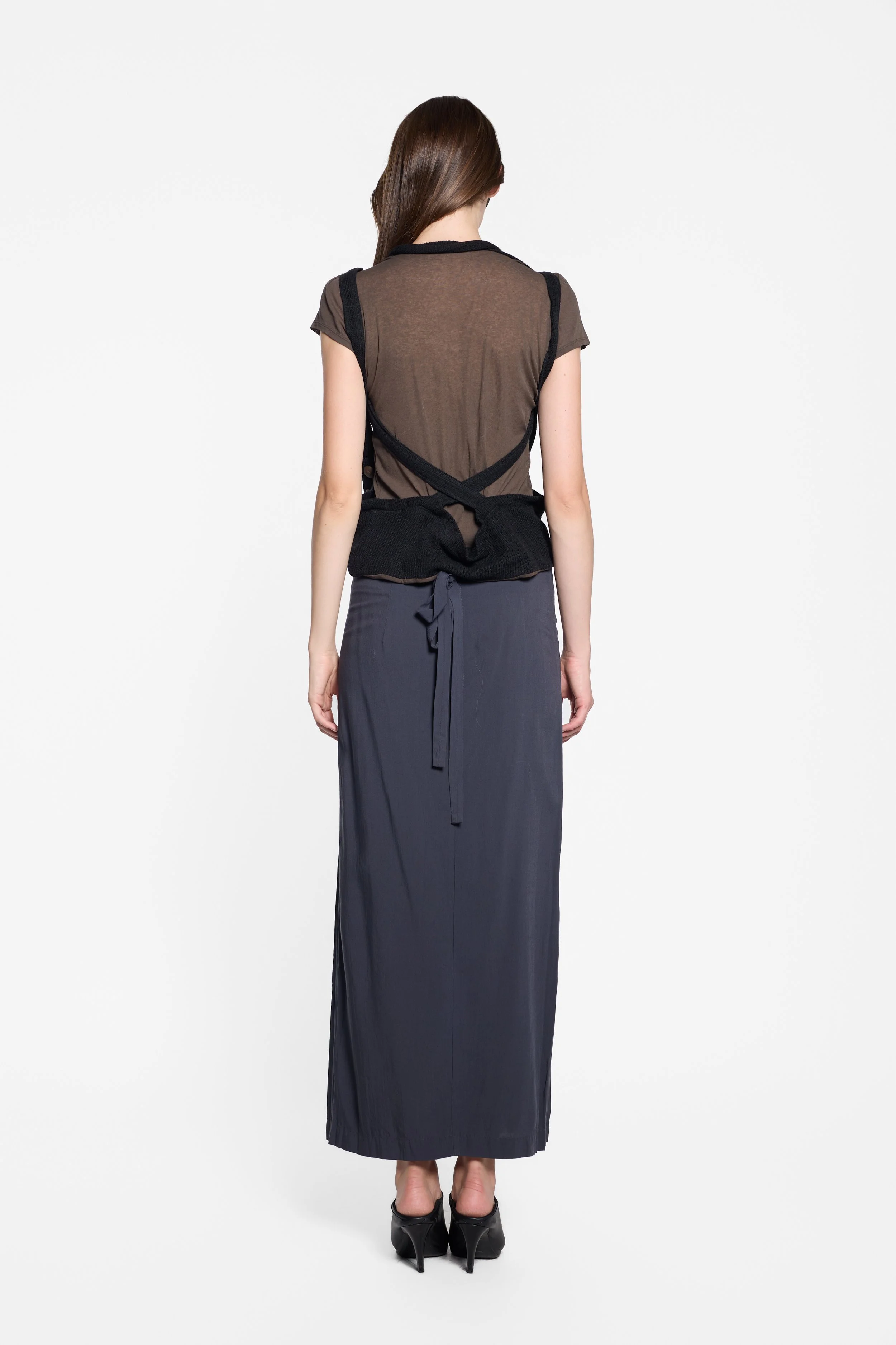 Back view of LUXXM knit top with black straps tied open