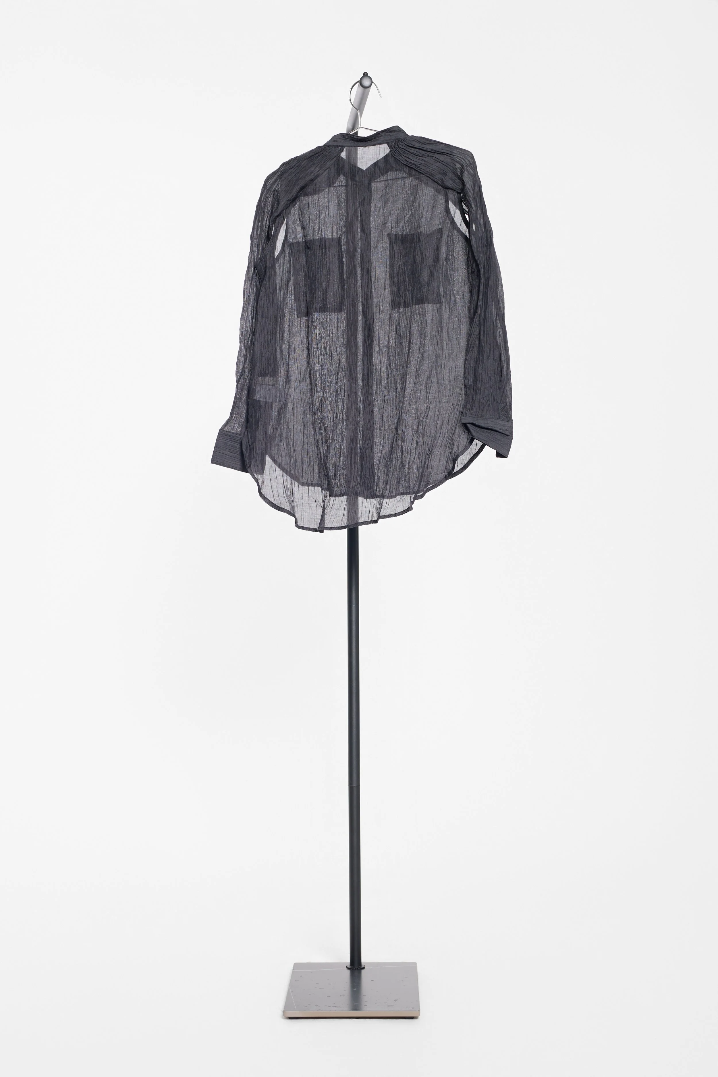 Full view of Pitless textured shirt with open draped sleeves