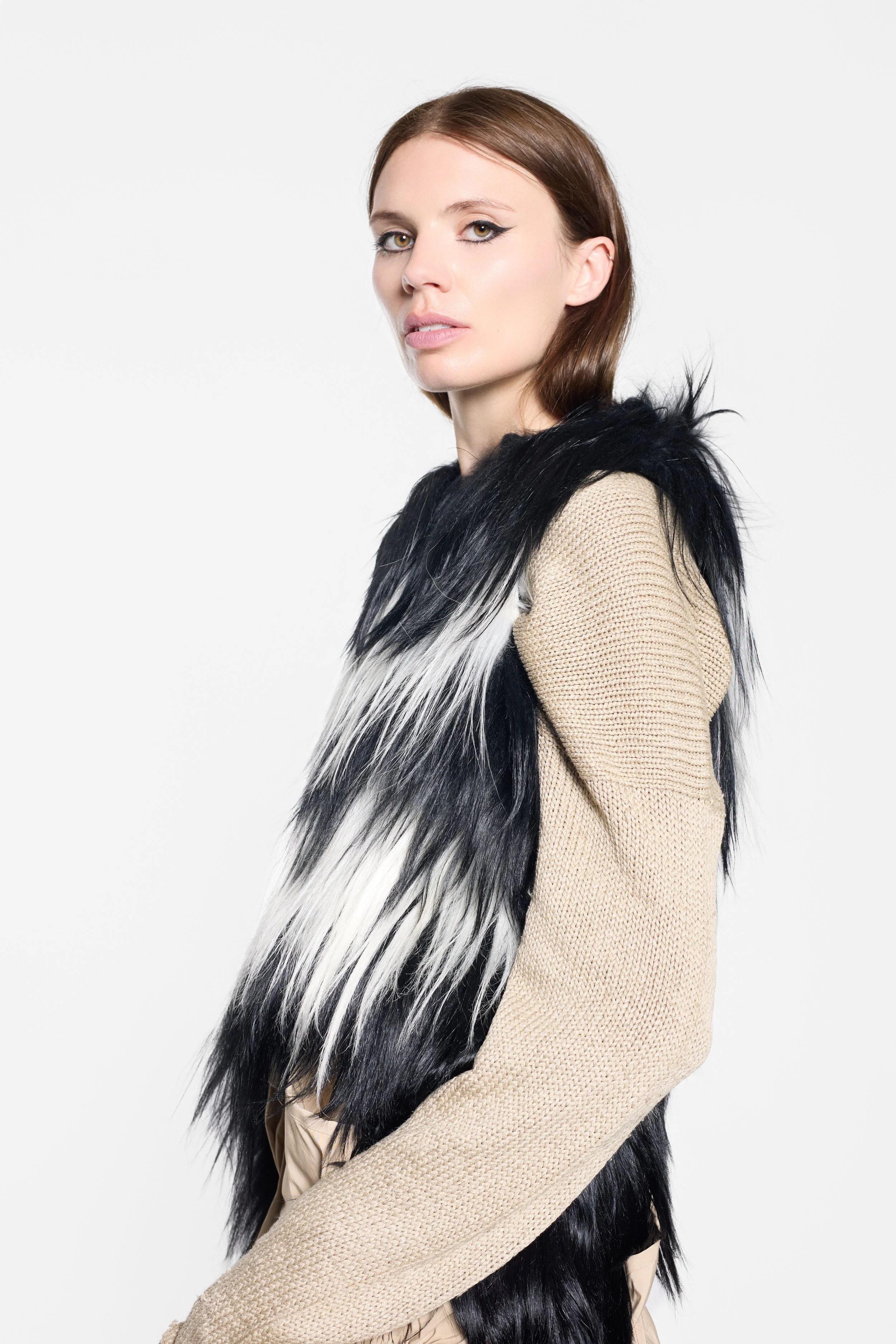 Detail of long shaggy fur framing the shoulder and hem