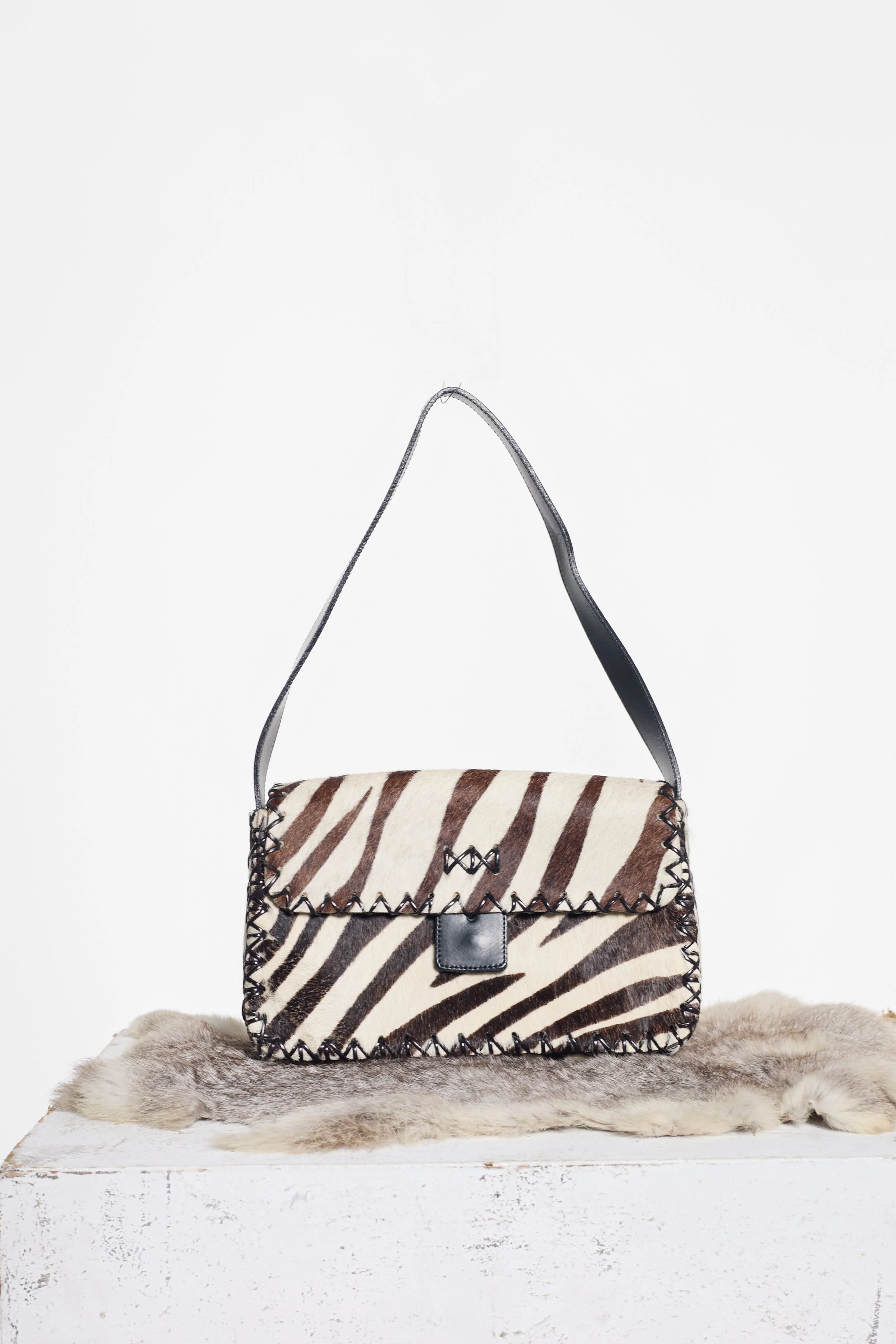 Front view of Russell & Bromley zebra cowhide bag