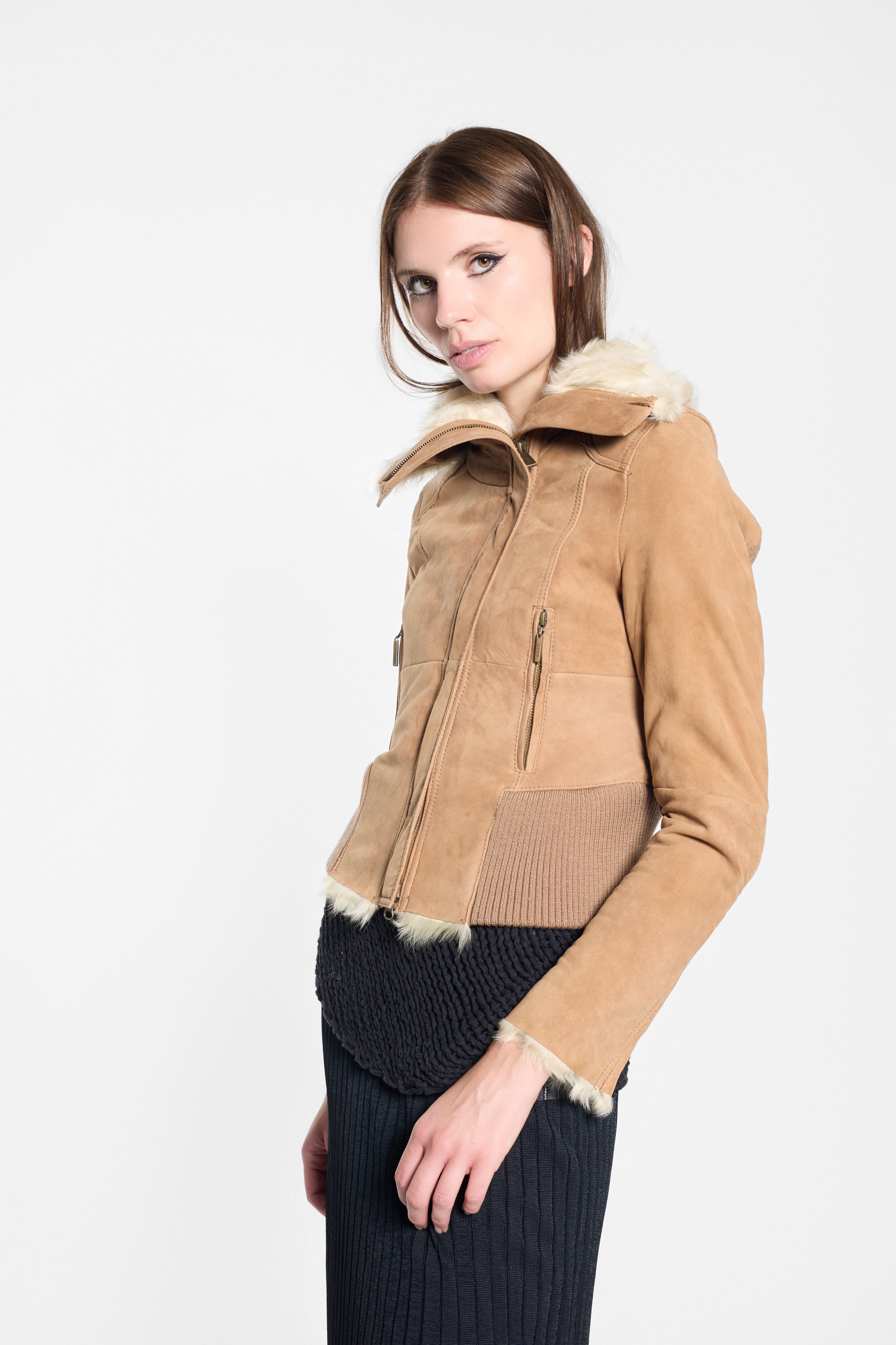 Close-up of cream fur collar and tan suede on Chelseagarb jacket