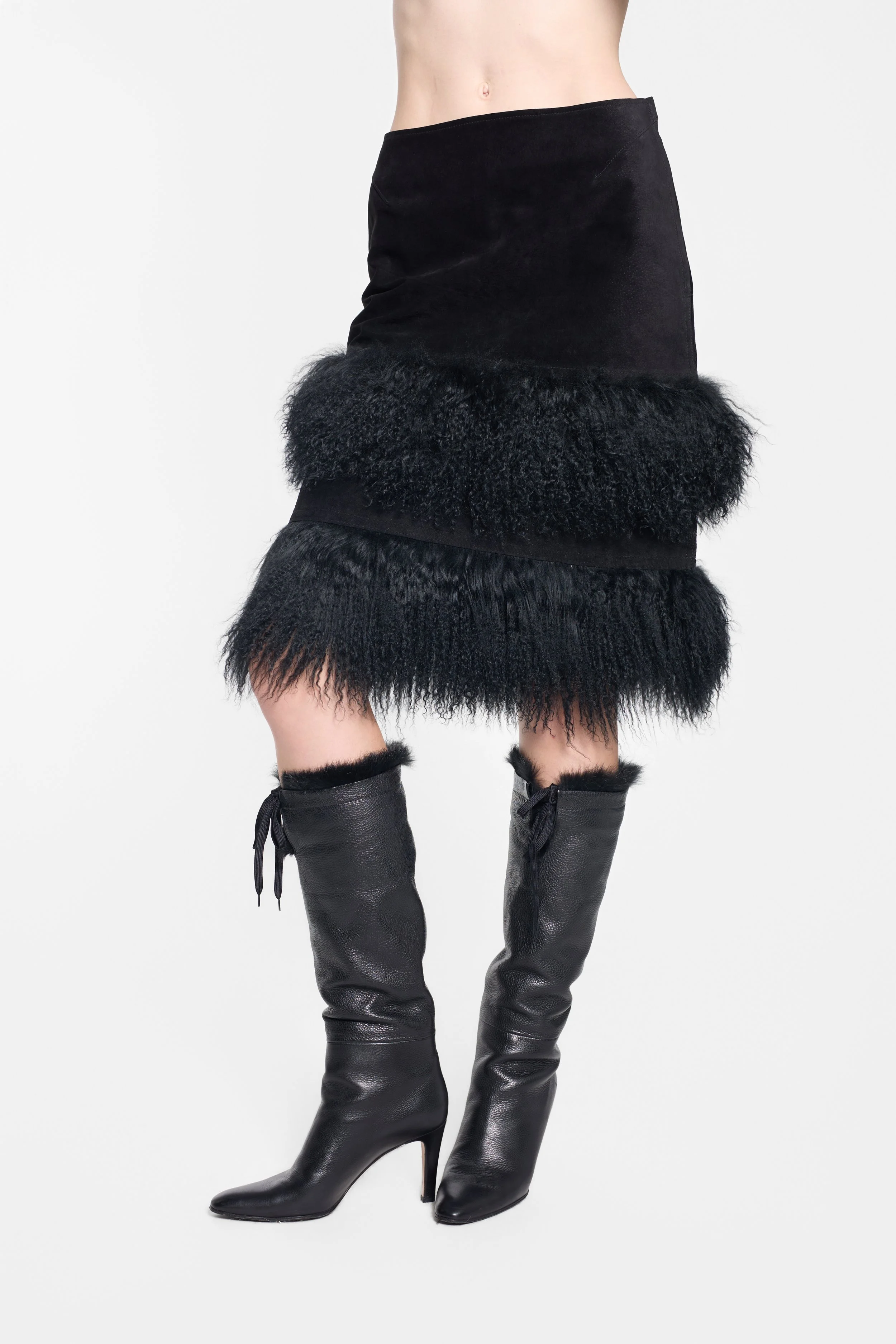 Black leather midi skirt with tiered shaggy fur bands