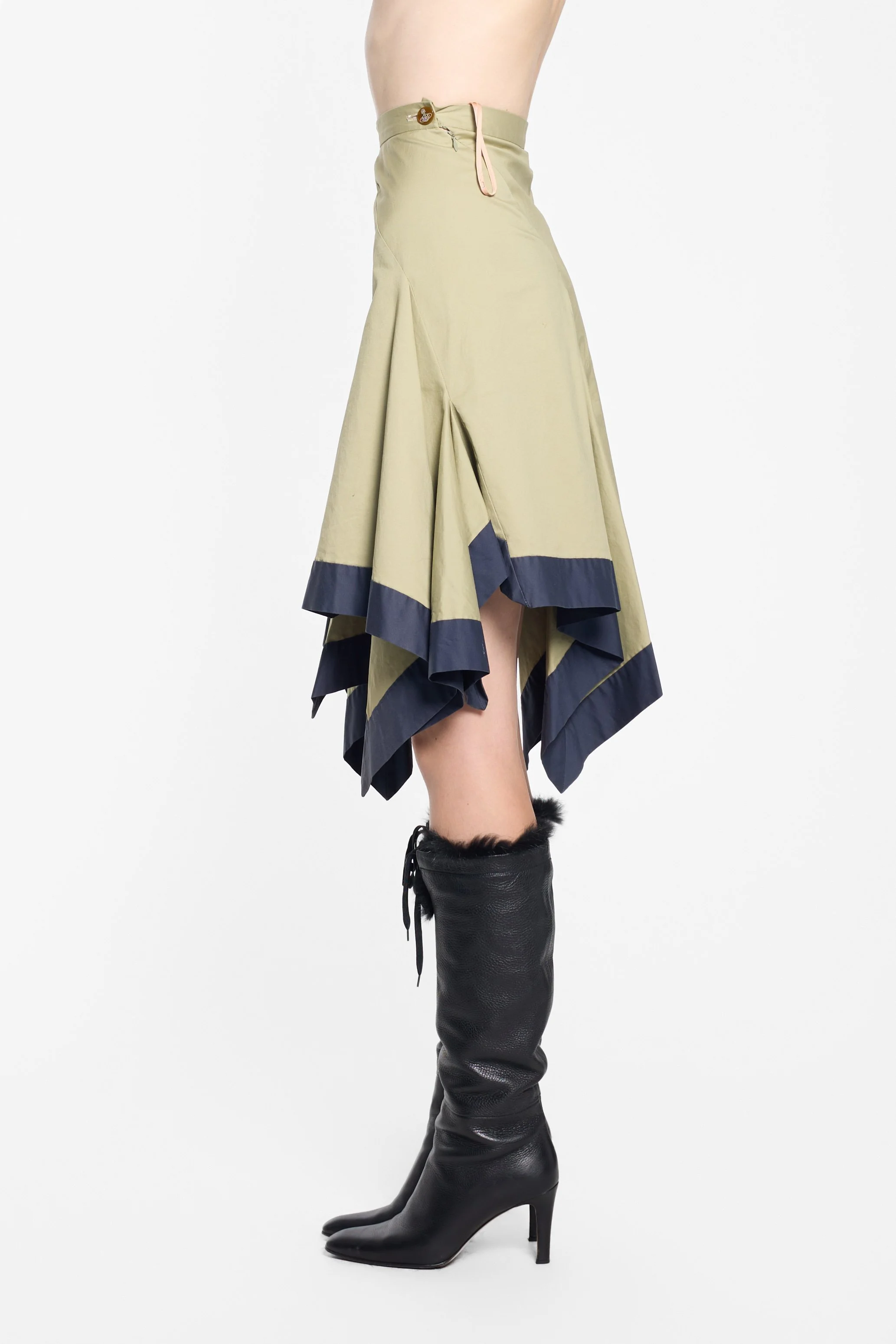 Vivienne Westwood olive asymmetric draped skirt worn on model, side view